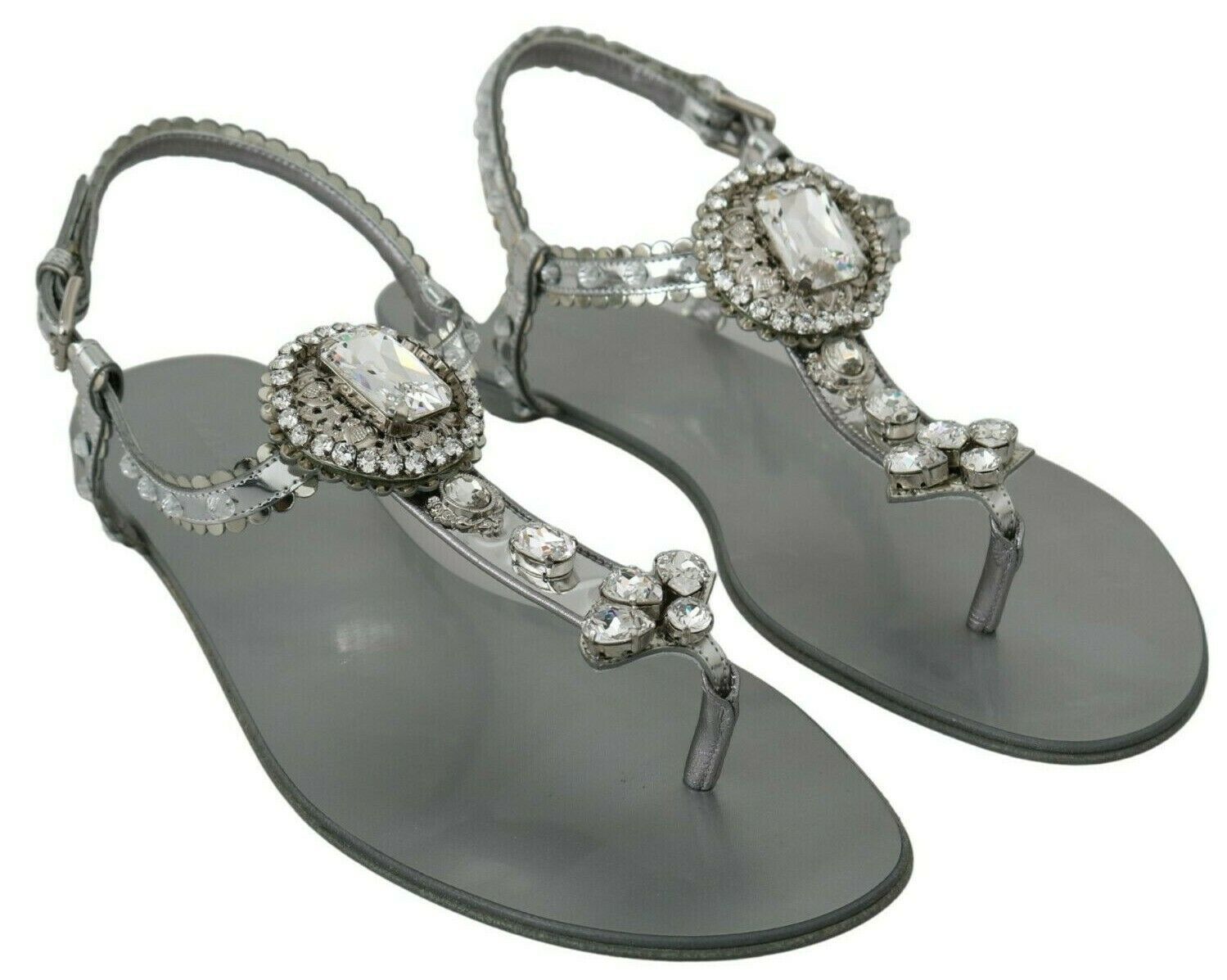 Dolce & Gabbana Elegante silberne Flats mit Kristallverzierungen