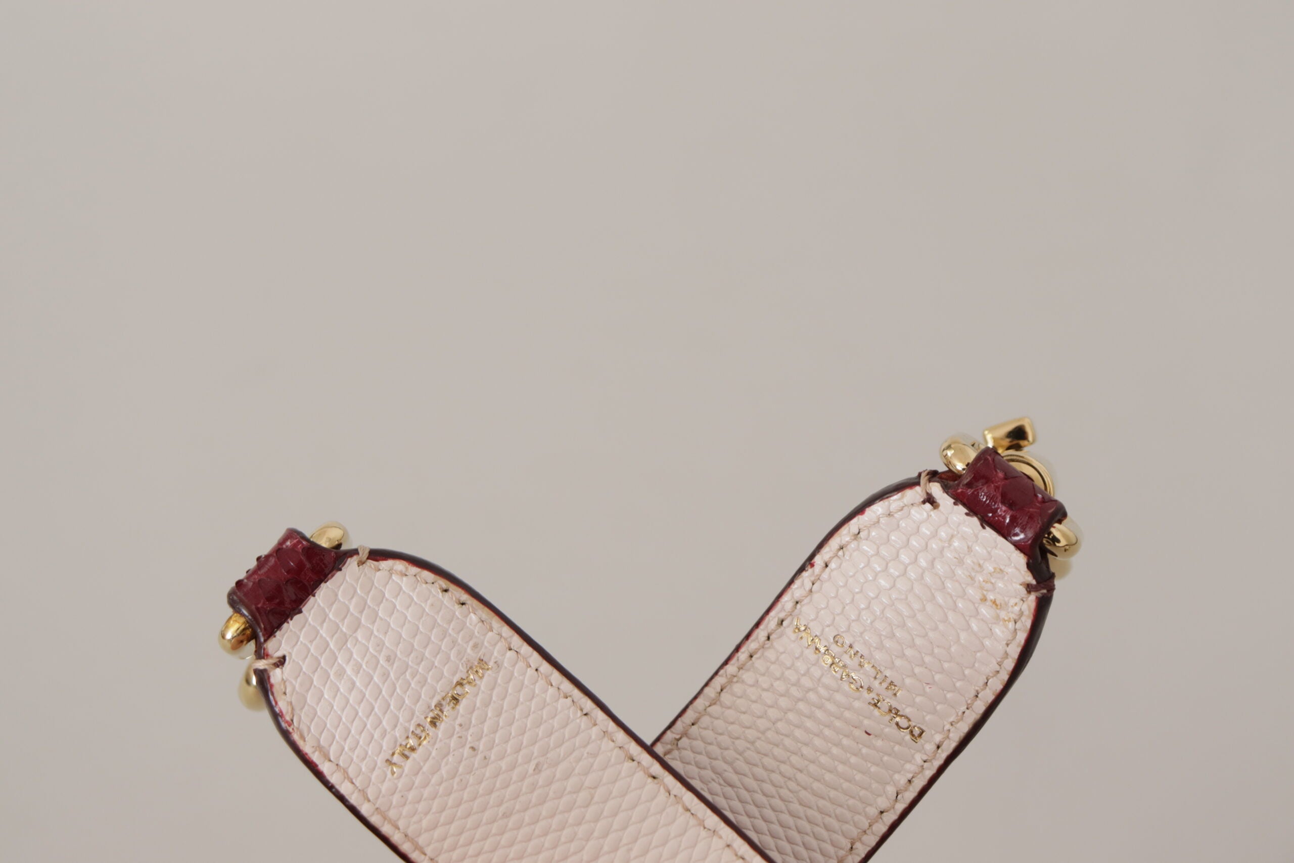 Geantă elegantă Dolce & Gabbana din piele de piton cu curea în culoarea bordeaux