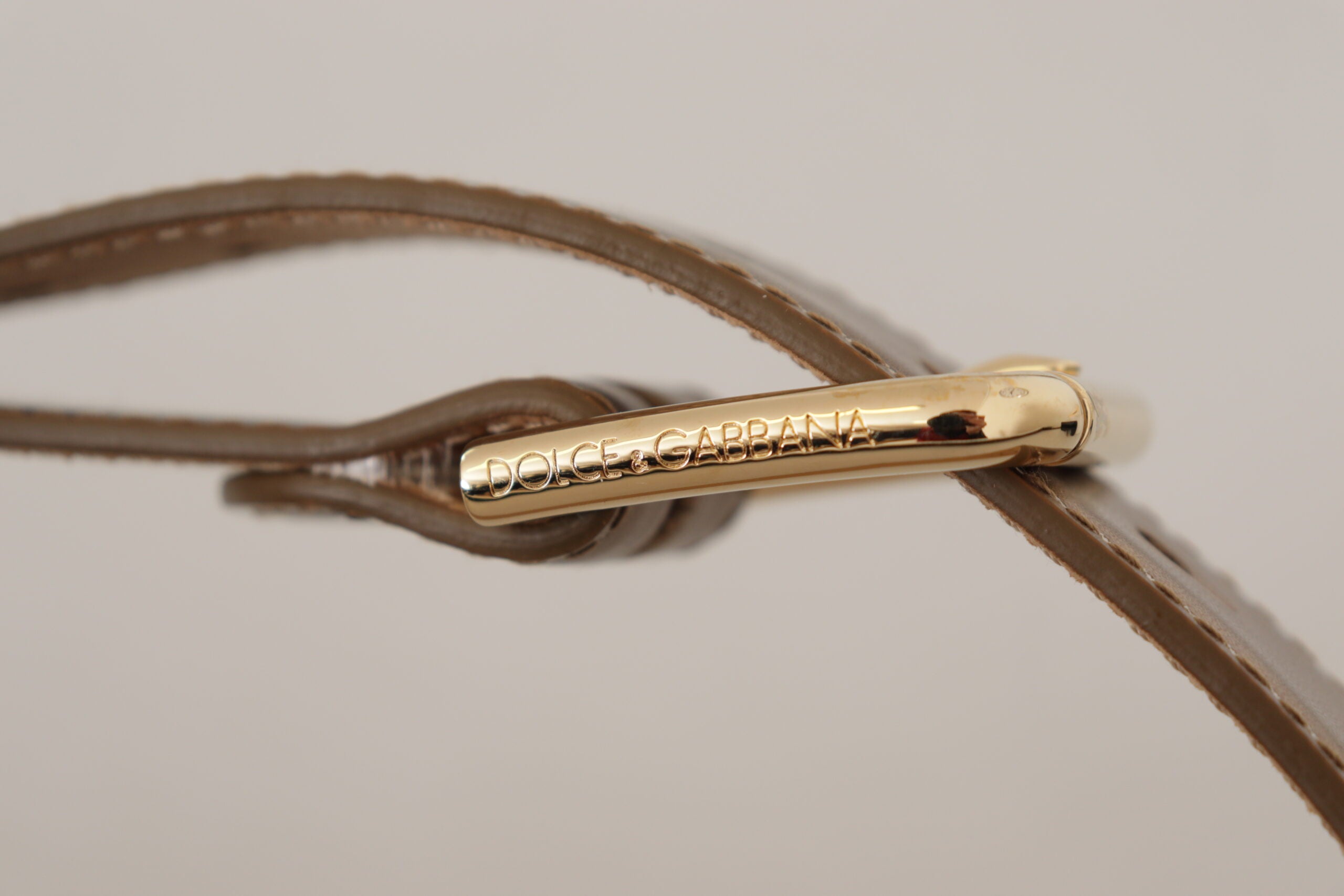 Dolce & Gabbana Bronzener Ledergürtel mit goldfarbener Schnalle