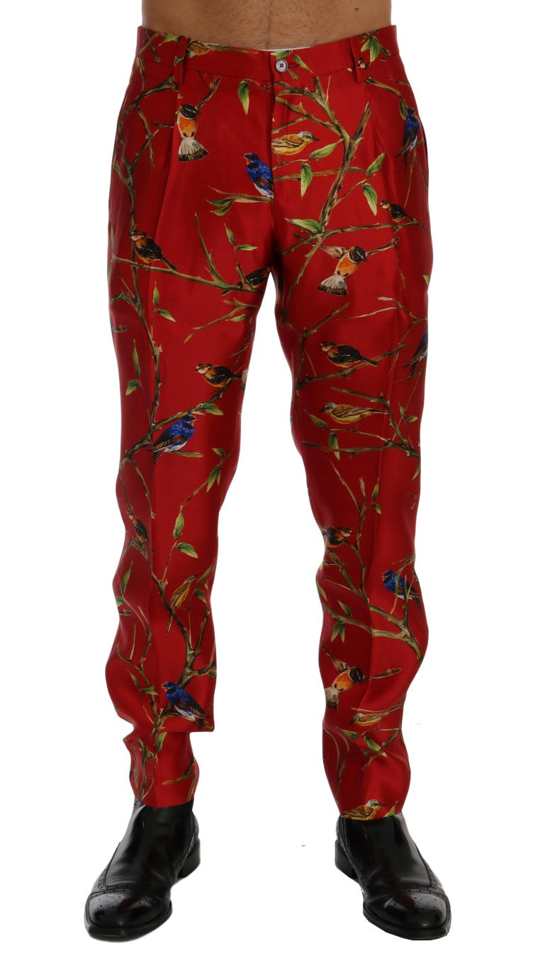 Dolce & Gabbana – Elegante Seidenhose mit rotem Vogel-Print