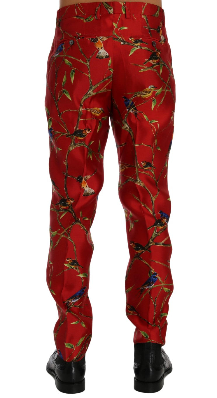 Dolce & Gabbana – Elegante Seidenhose mit rotem Vogel-Print
