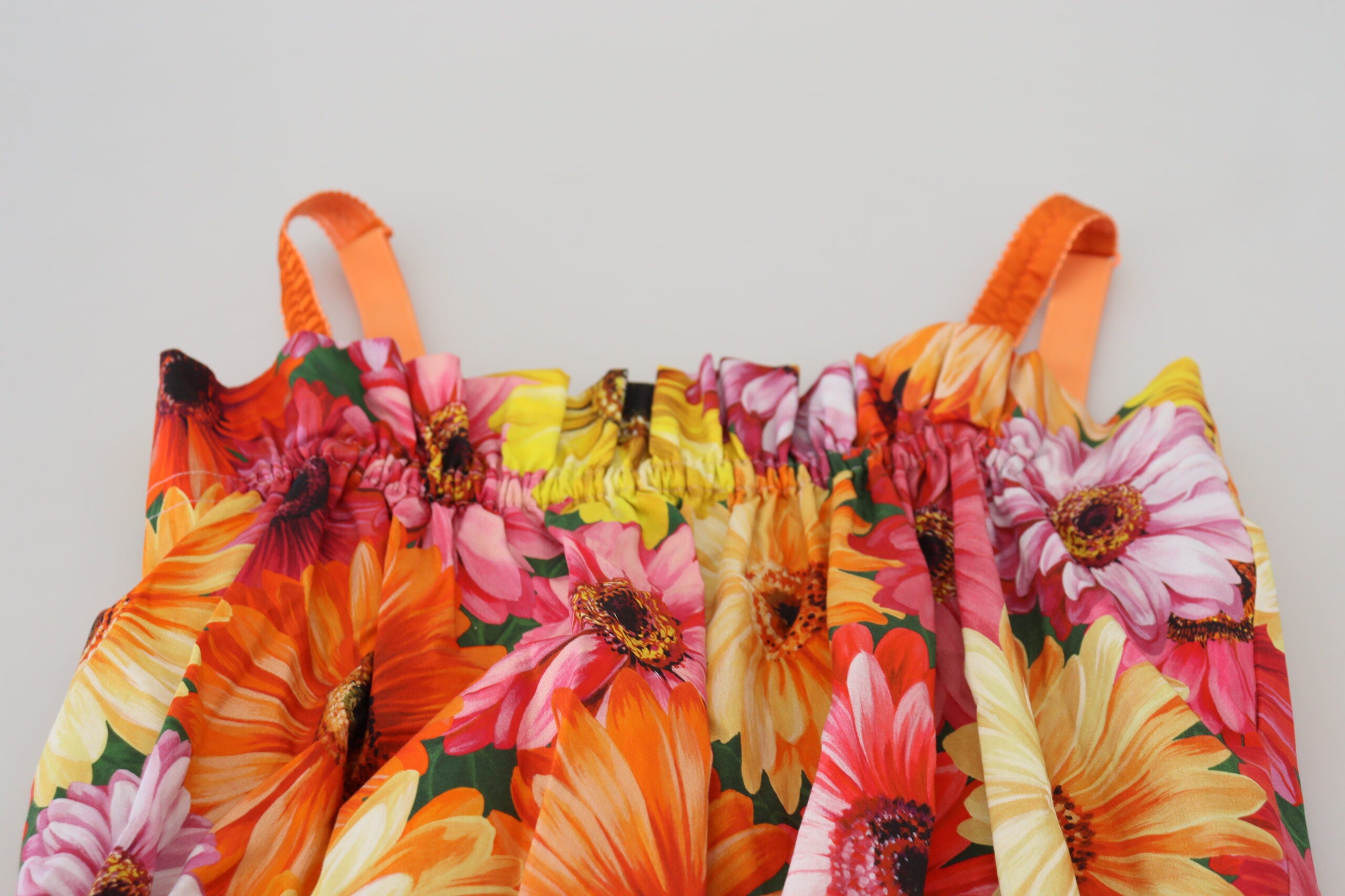 Dolce & Gabbana – Ärmelloses, kurzes Oberteil mit floraler Eleganz
