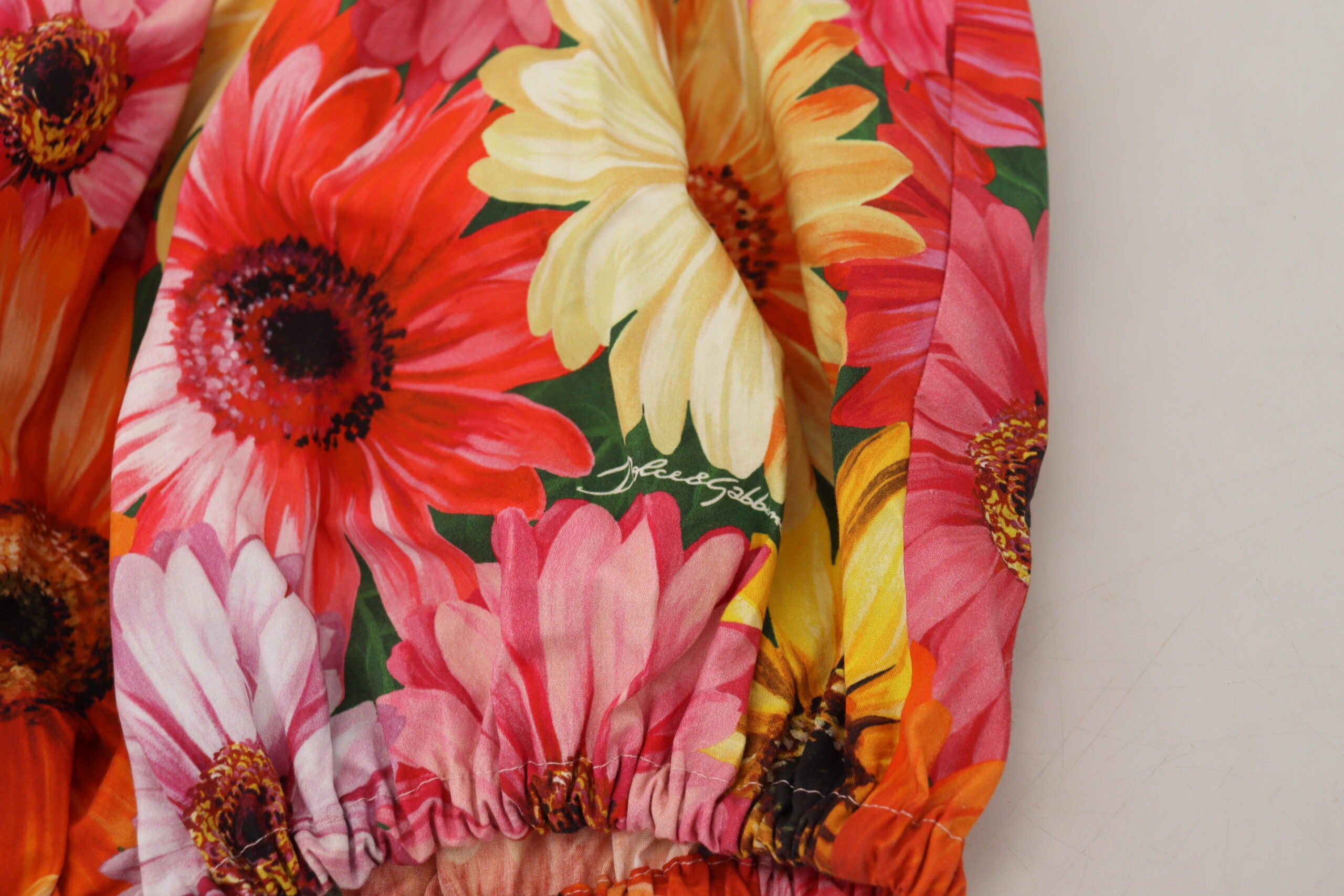 Dolce & Gabbana – Ärmelloses, kurzes Oberteil mit floraler Eleganz
