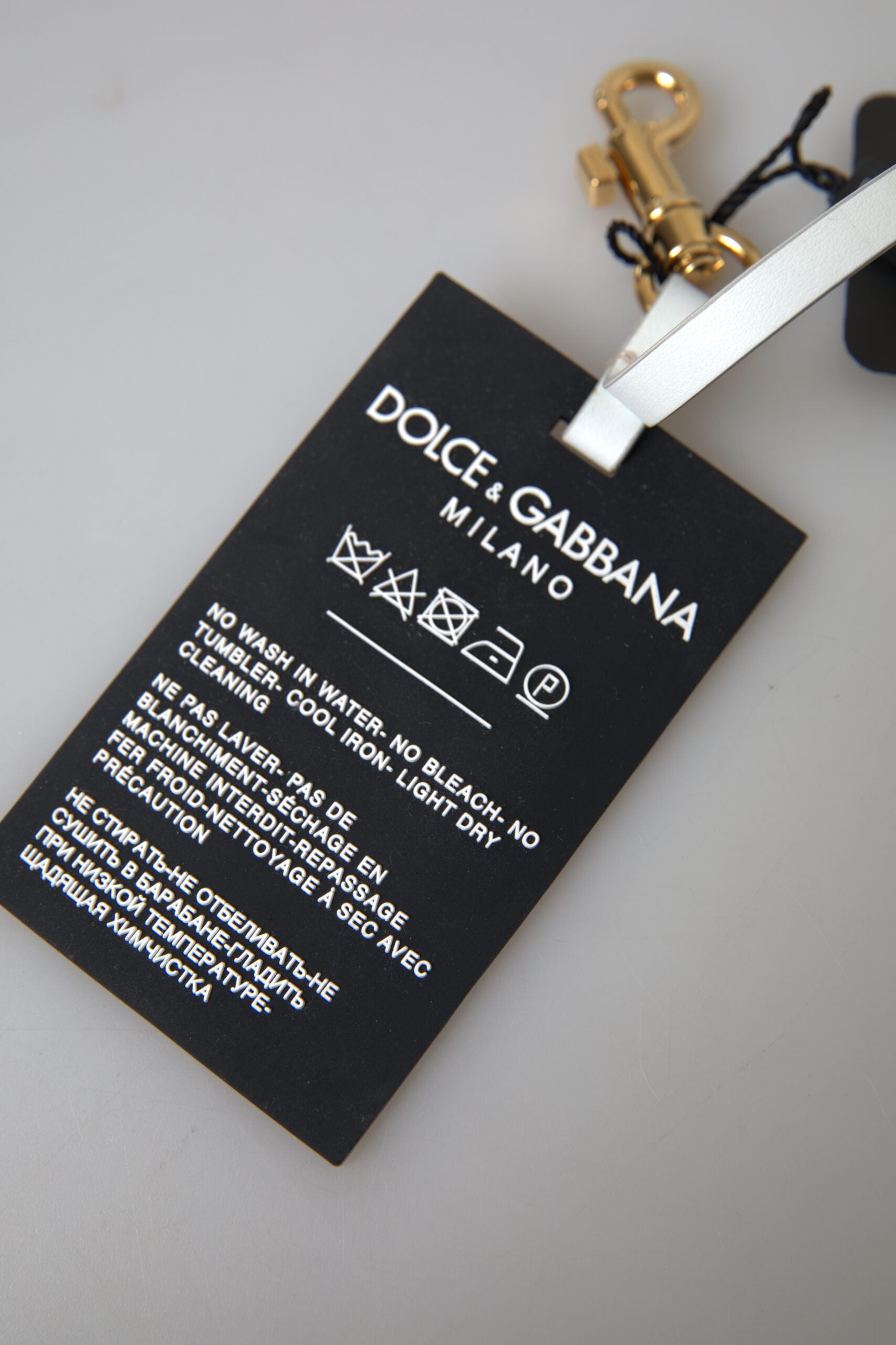 Dolce & Gabbana Chic Schwarz-Gold Designer-Schlüsselanhänger
