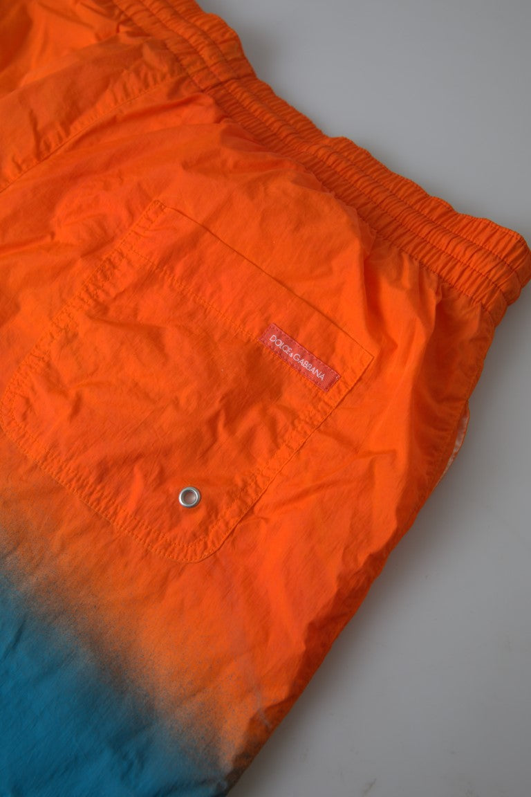 Dolce & Gabbana – Badeshorts mit Farbverlaufseffekt in leuchtendem Orange