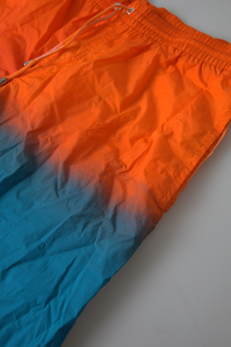 Dolce & Gabbana – Badeshorts mit Farbverlaufseffekt in leuchtendem Orange