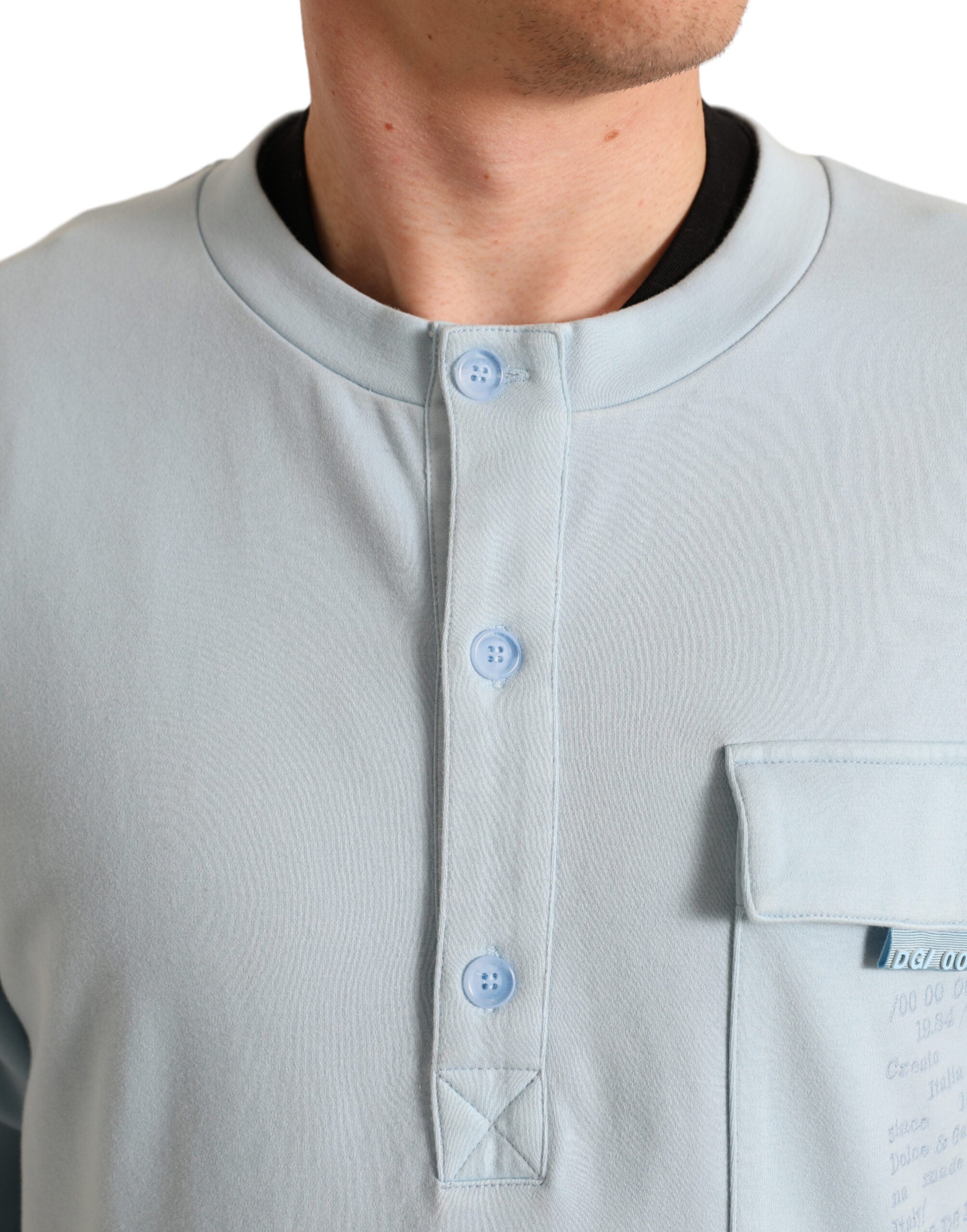 Dolce & Gabbana Eleganter hellblauer Pullover aus Baumwollmischung mit Rundhalsausschnitt
