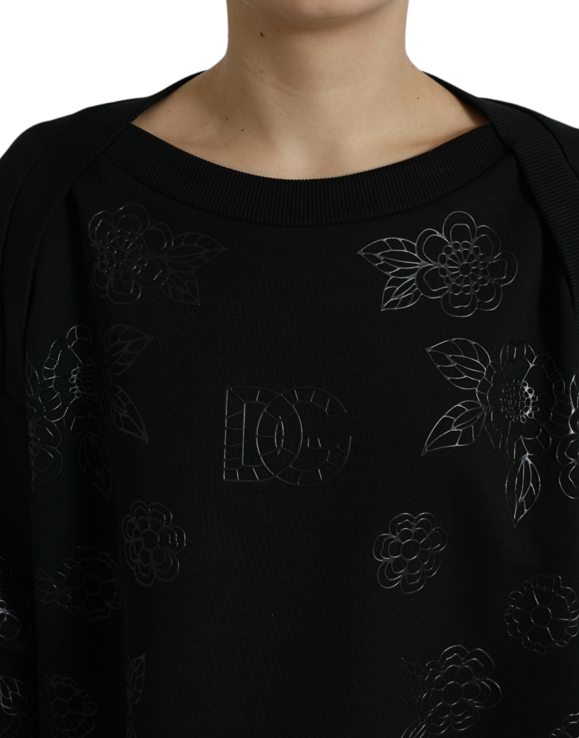 Dolce & Gabbana – Eleganter schwarzer Pullover mit Blumenapplikation