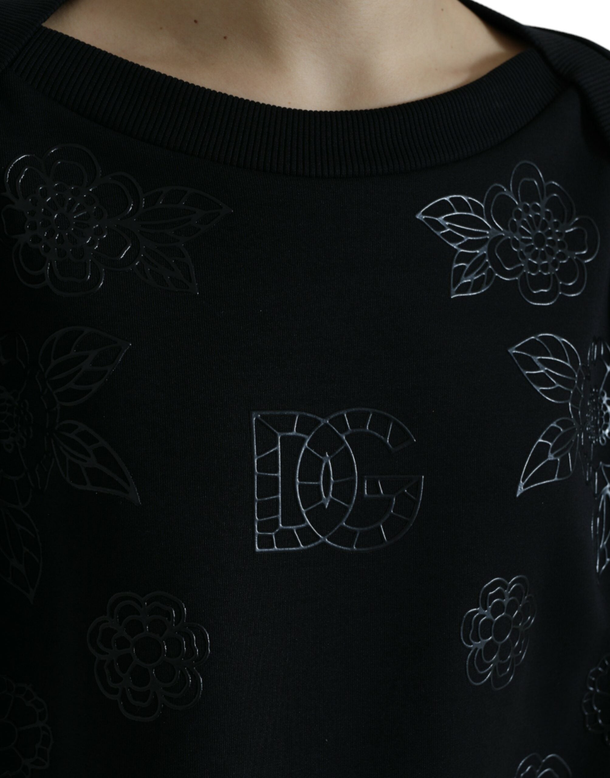 Dolce & Gabbana – Eleganter schwarzer Pullover mit Blumenapplikation