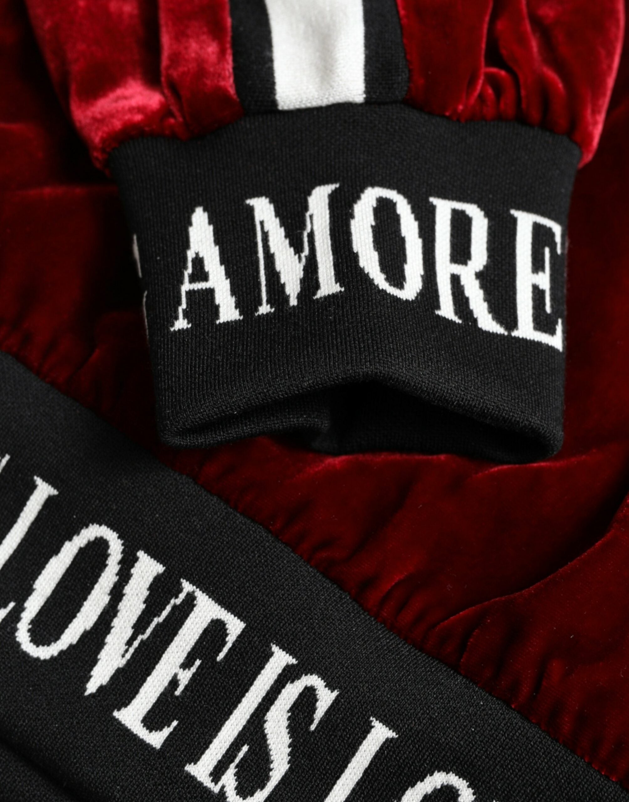Dolce & Gabbana Eleganter Pullover aus burgunderroter Seidenmischung