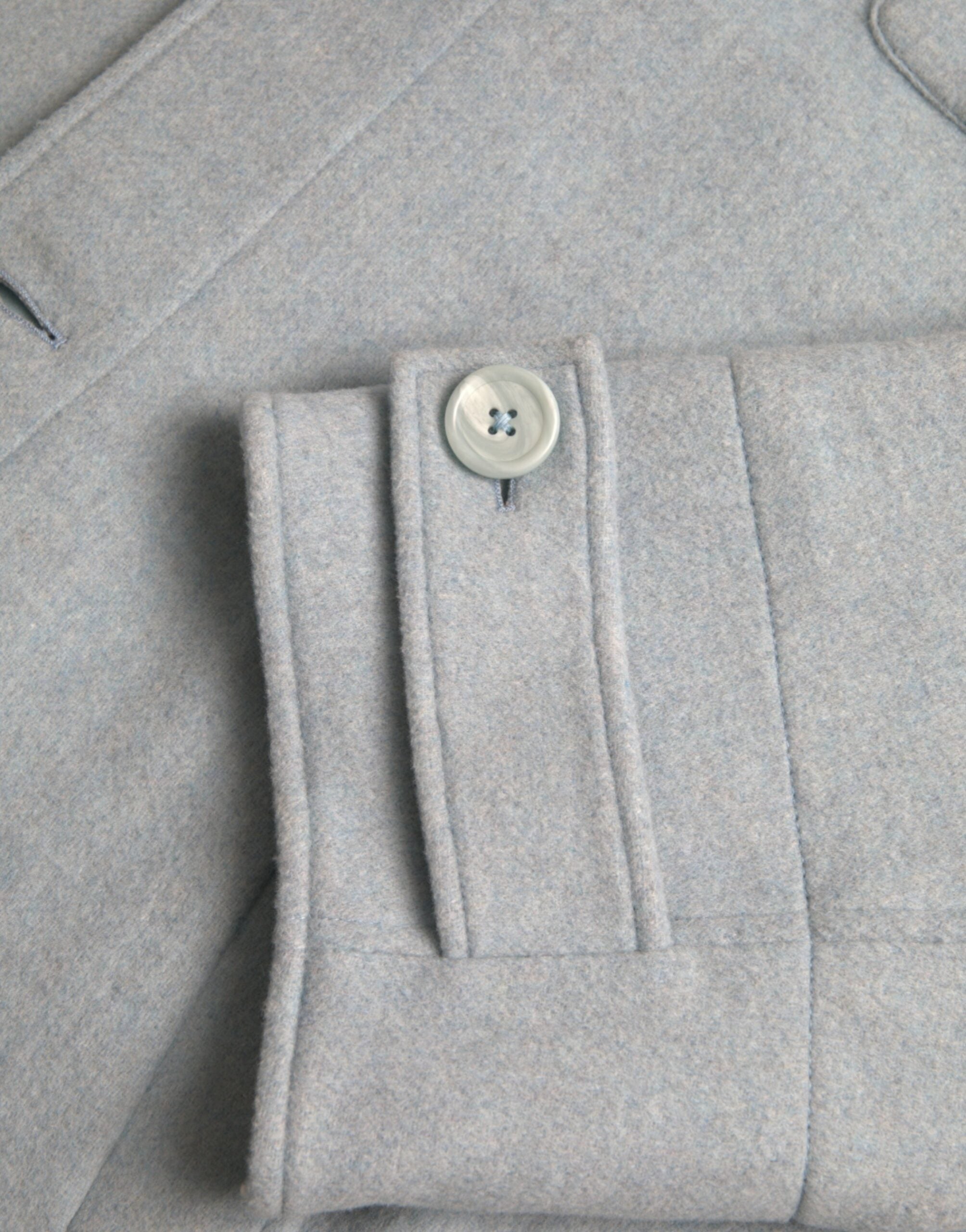 Dolce & Gabbana – Hellblaue Trenchcoat-Jacke aus Wolle mit Knöpfen