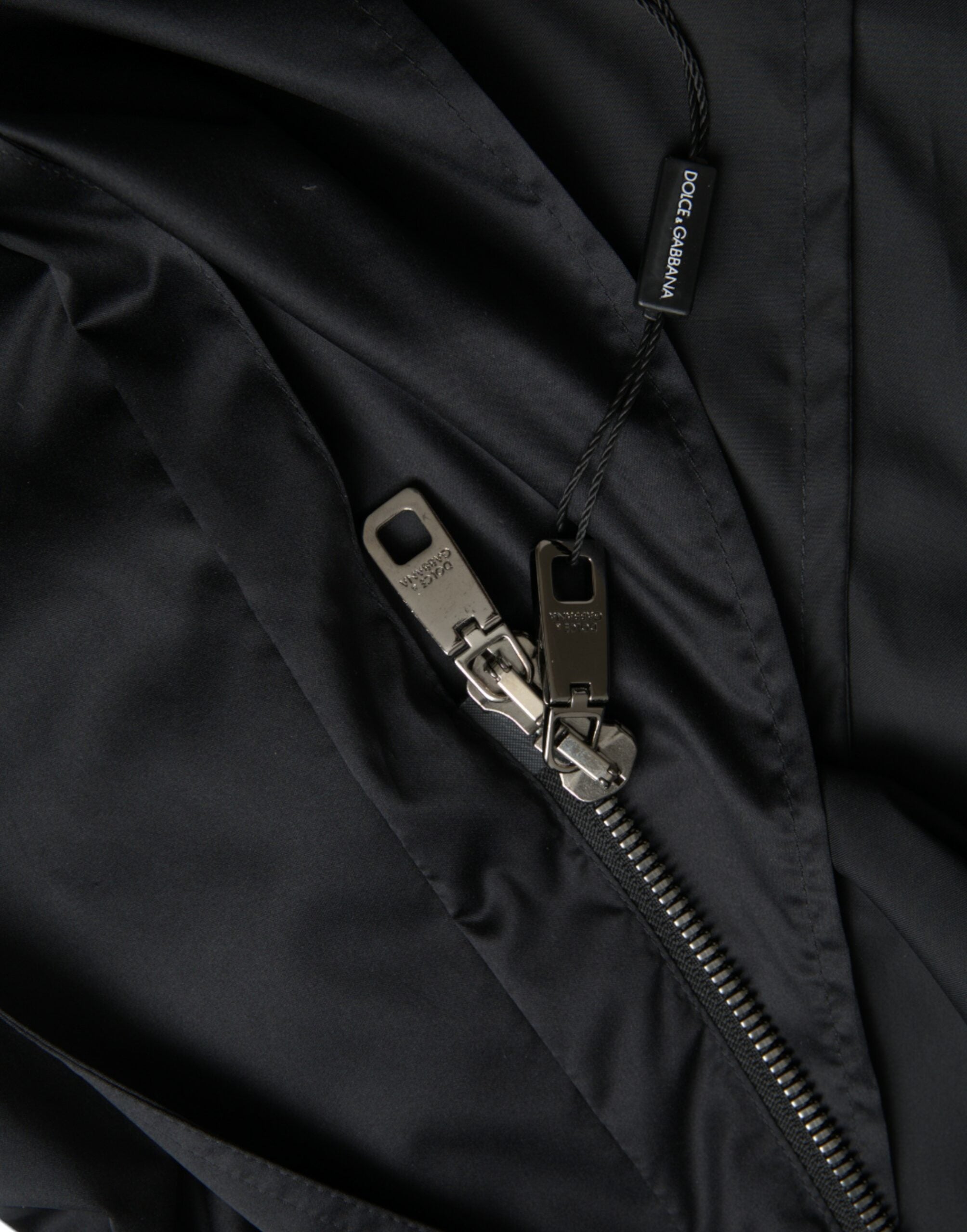 Dolce & Gabbana – Lange Windjacke aus schwarzem Polyester mit Kapuze