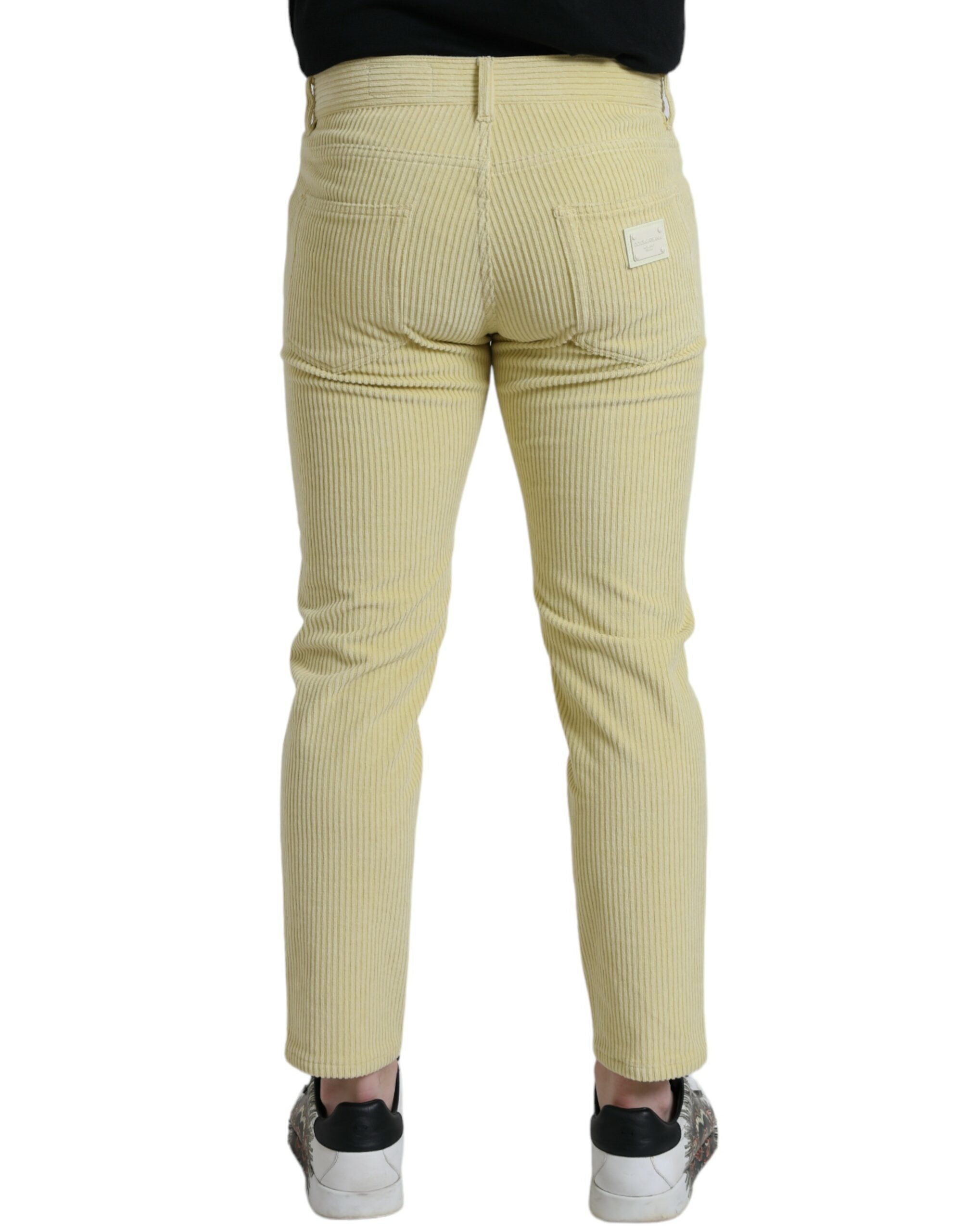 Dolce & Gabbana – Gelbe Skinny-Jeans aus Cord mit Logo-Schild