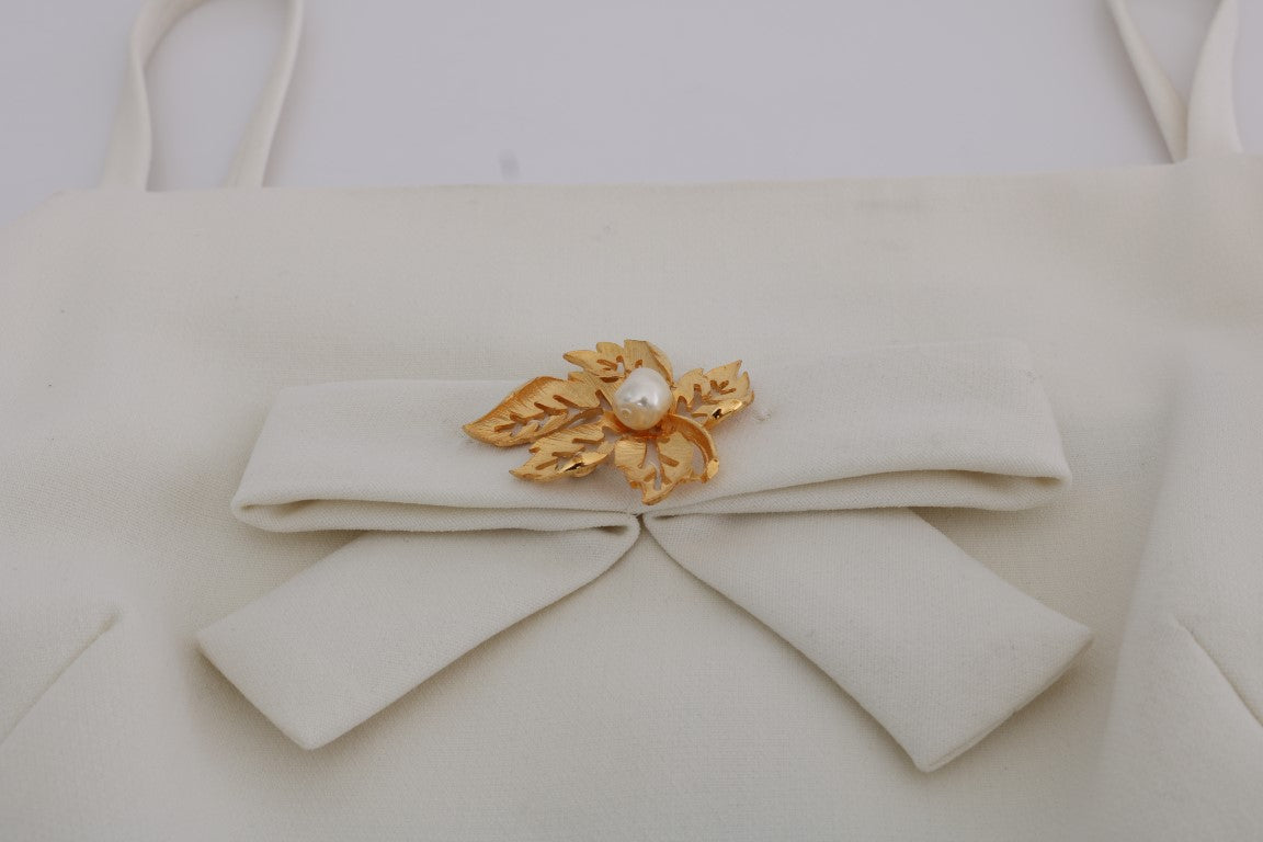 Dolce & Gabbana Elegantes weißes Woll-Etuikleid mit goldener Brosche