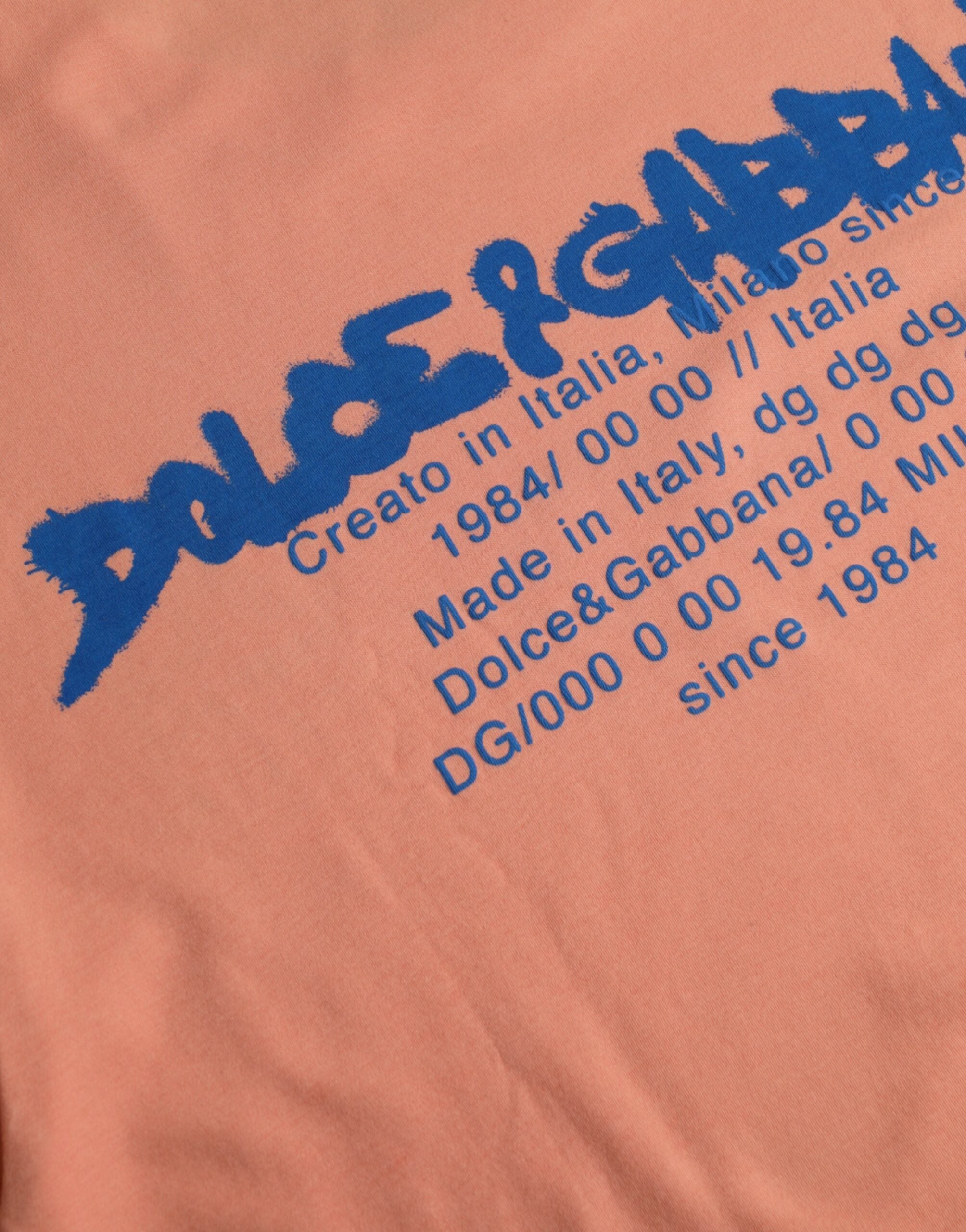 Dolce & Gabbana – Korallenfarbenes, kurzärmliges Baumwoll-T-Shirt mit Logo-Print