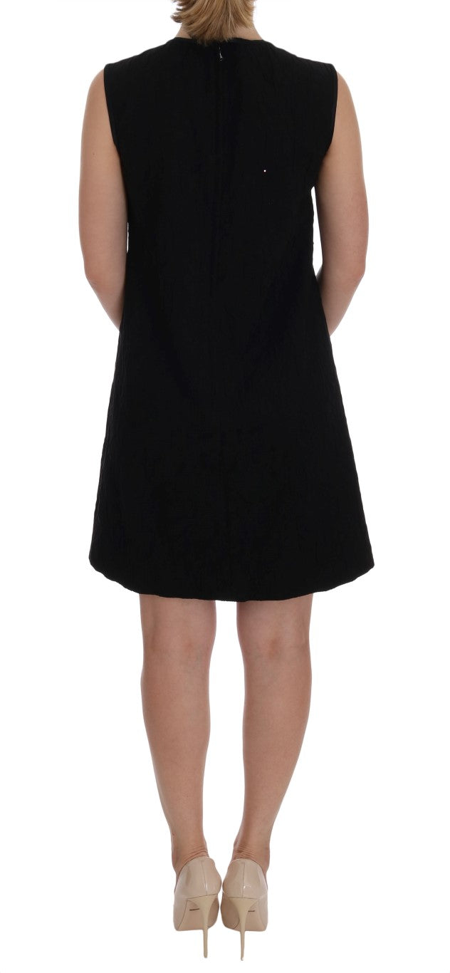 Dolce & Gabbana Schwarzes Stretch-Minikleid mit Kristallverzierung