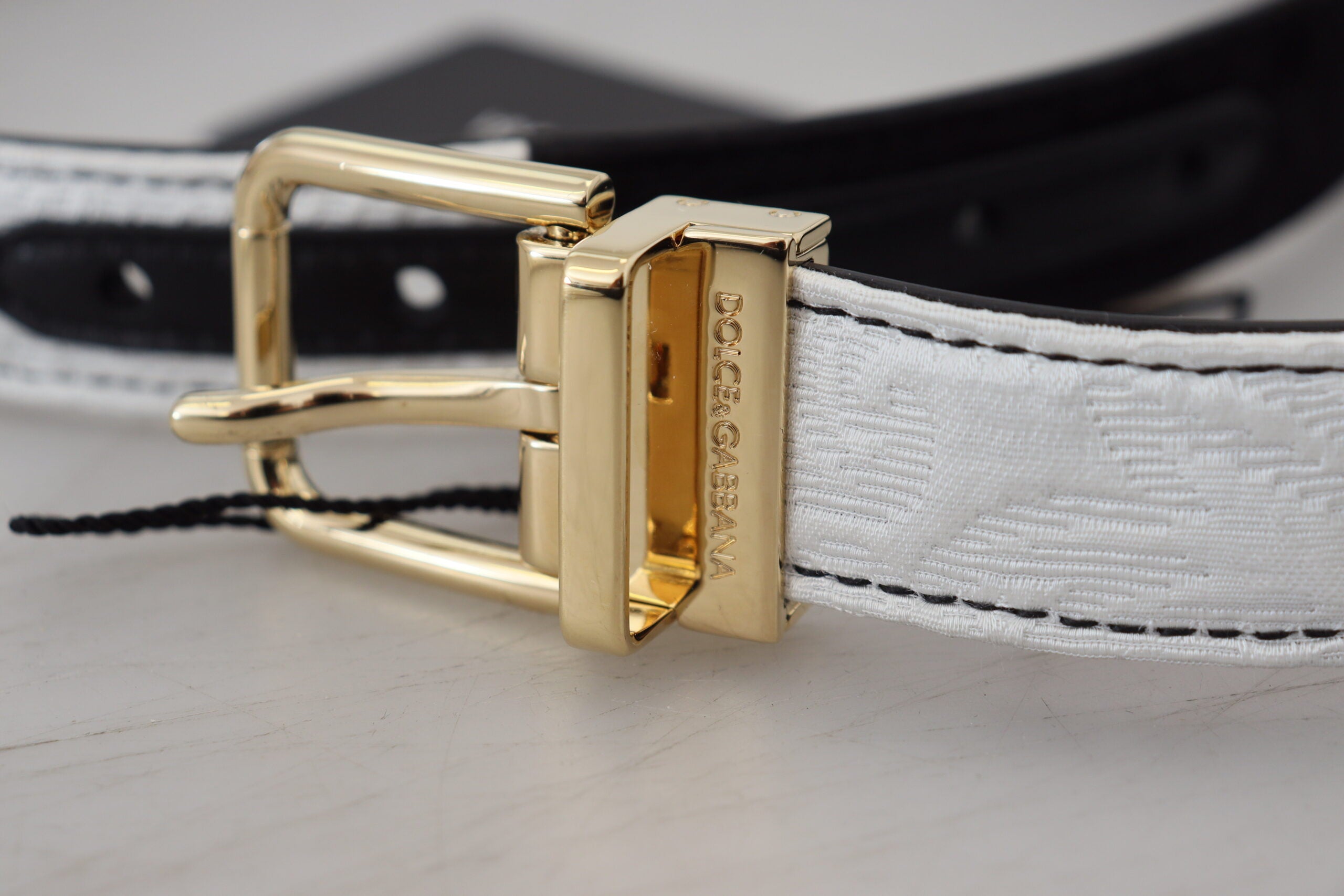 Dolce & Gabbana Weiß-Schwarzer Patchwork-Gürtel mit goldener Metallschnalle