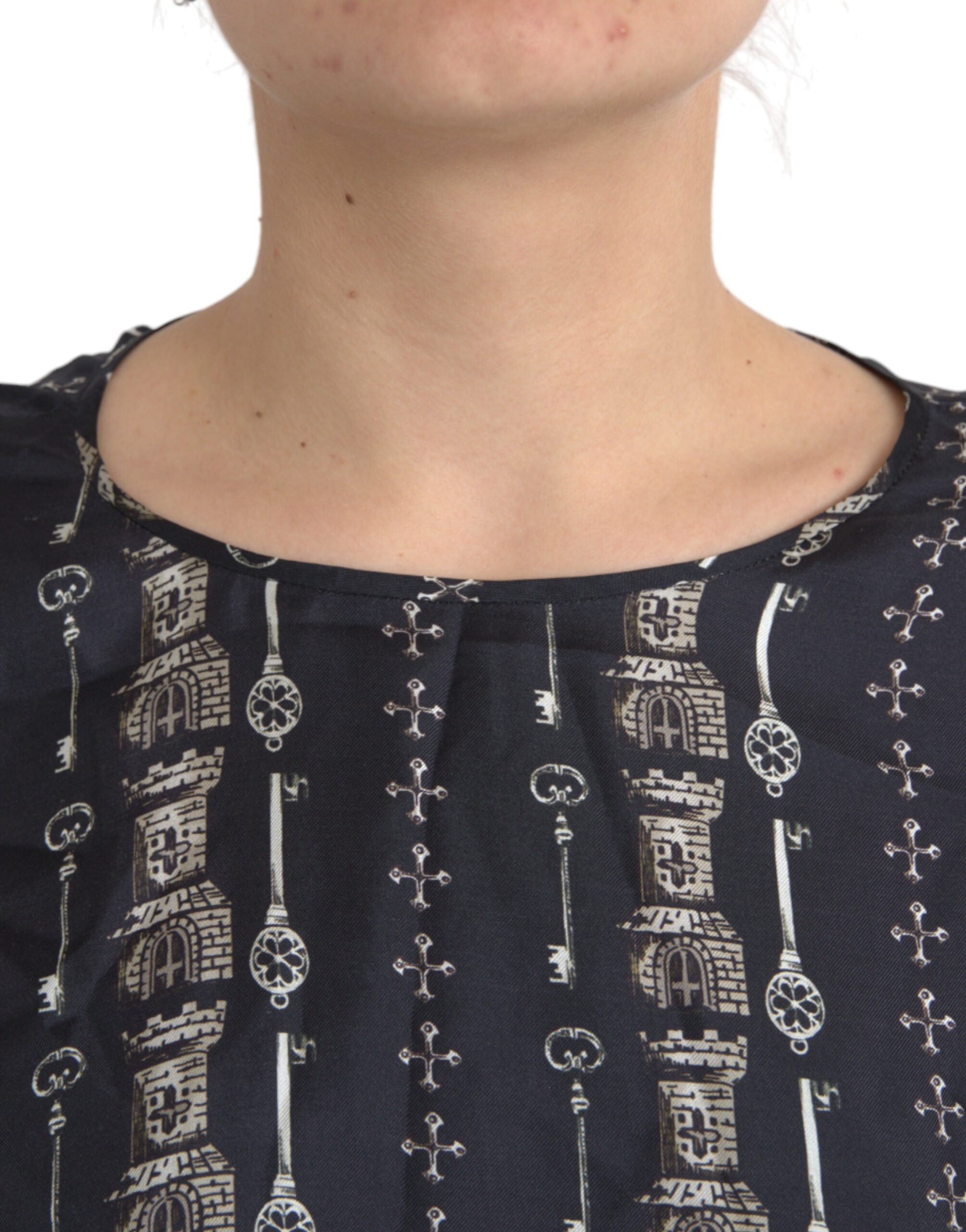 Dolce & Gabbana – Schwarzes Seidenblusen-T-Shirt mit Schloss-Print