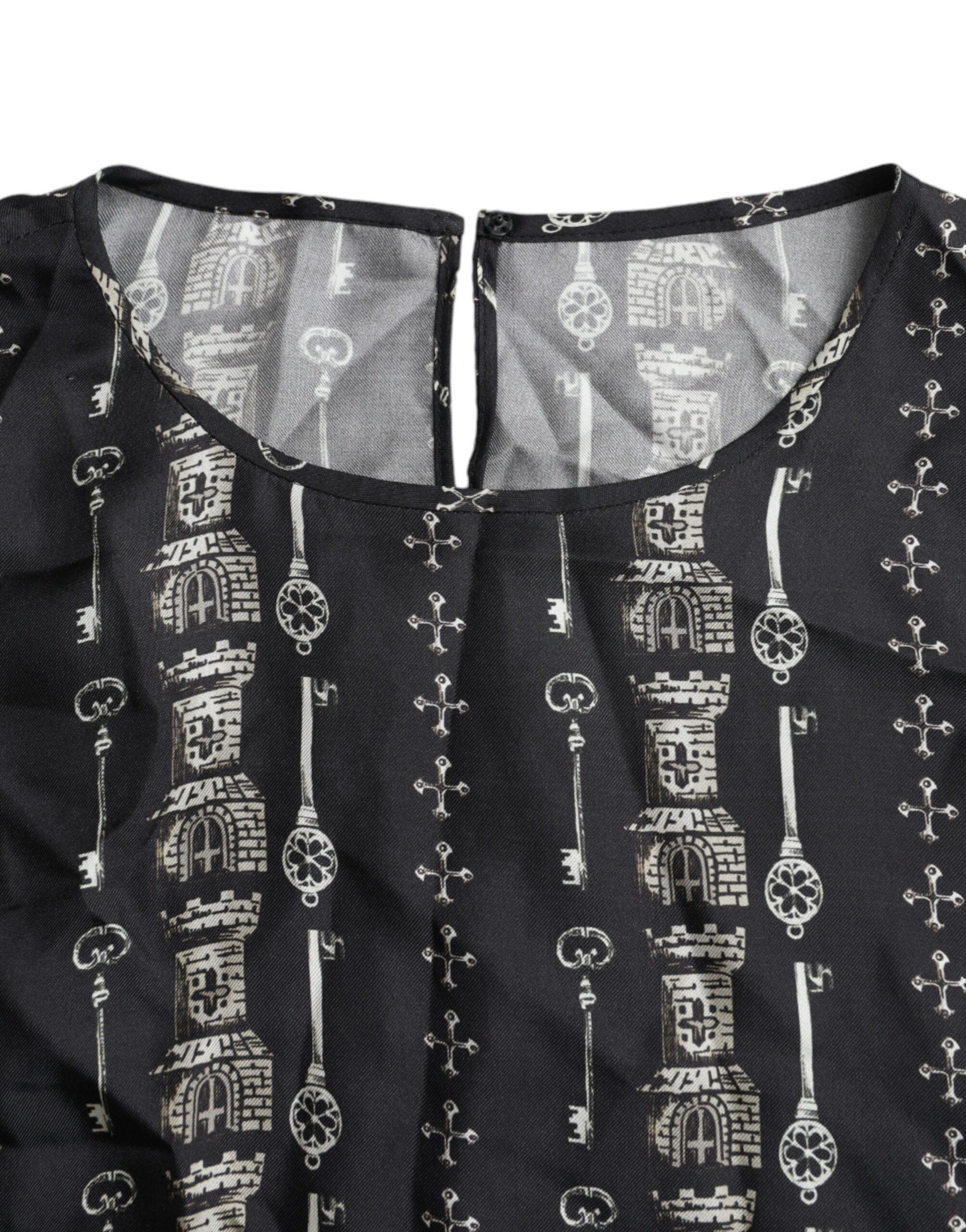 Dolce & Gabbana – Schwarzes Seidenblusen-T-Shirt mit Schloss-Print