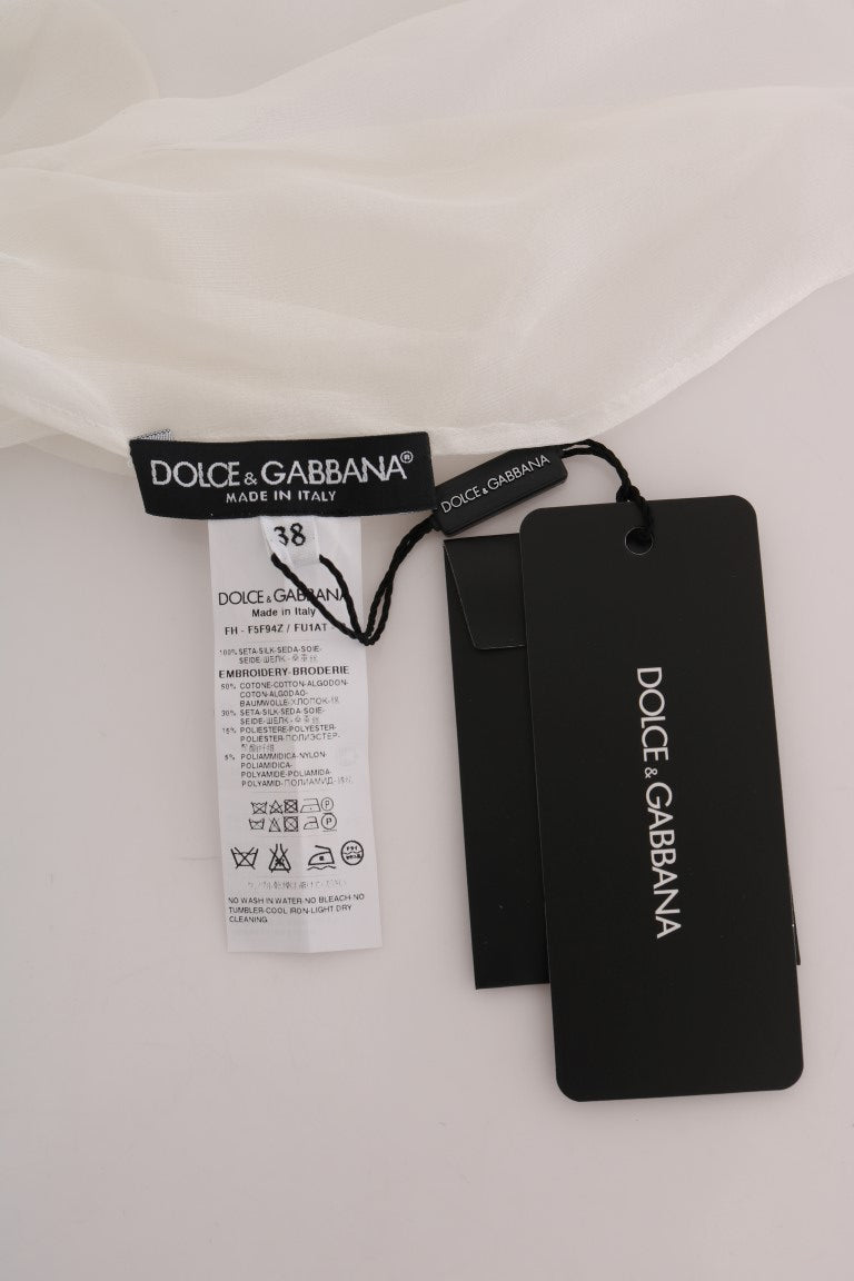 Dolce & Gabbana Elegante weiße Seidenbluse mit Gänseblümchenmuster