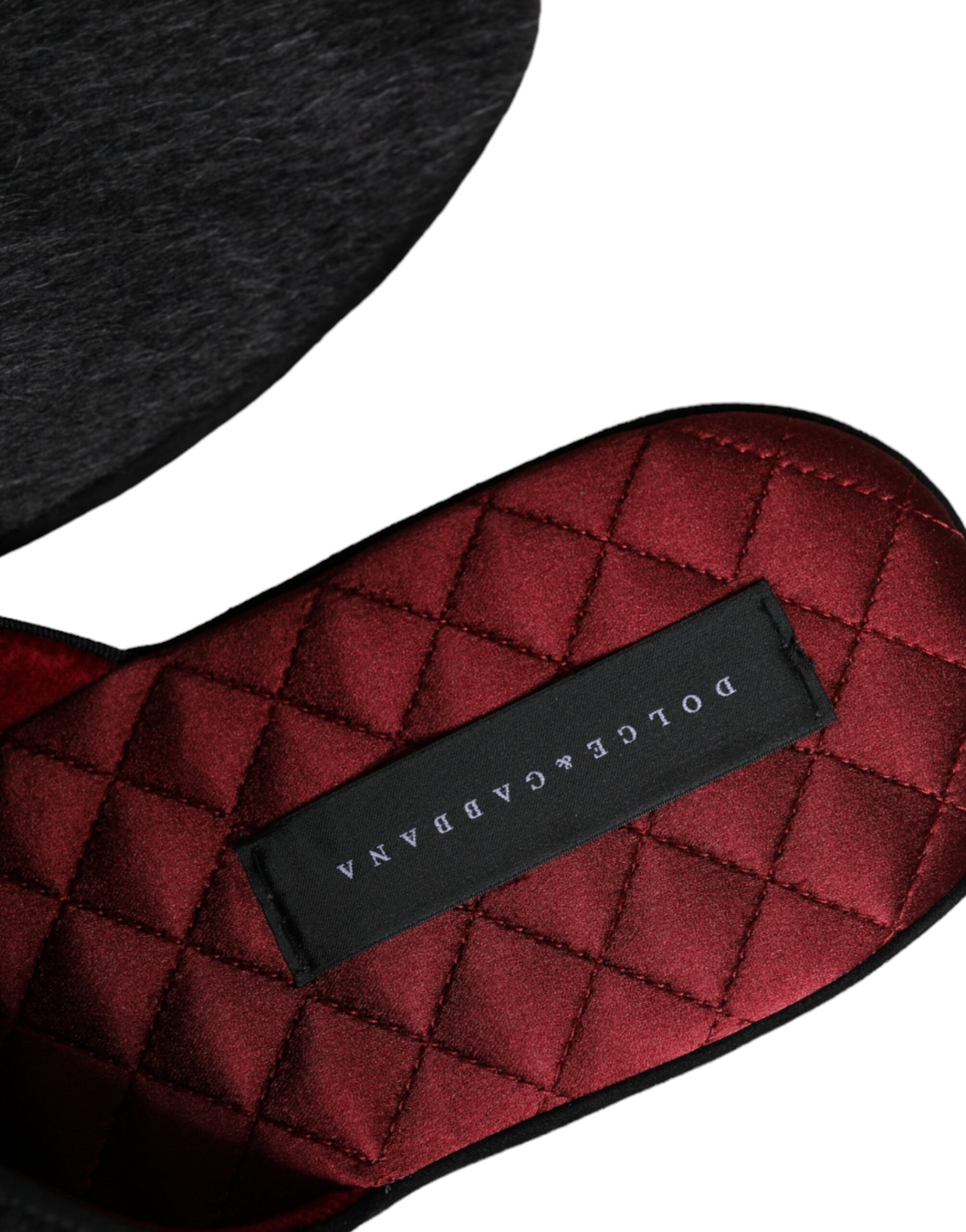 Dolce & Gabbana – Slipper aus schwarzem Kunstfell