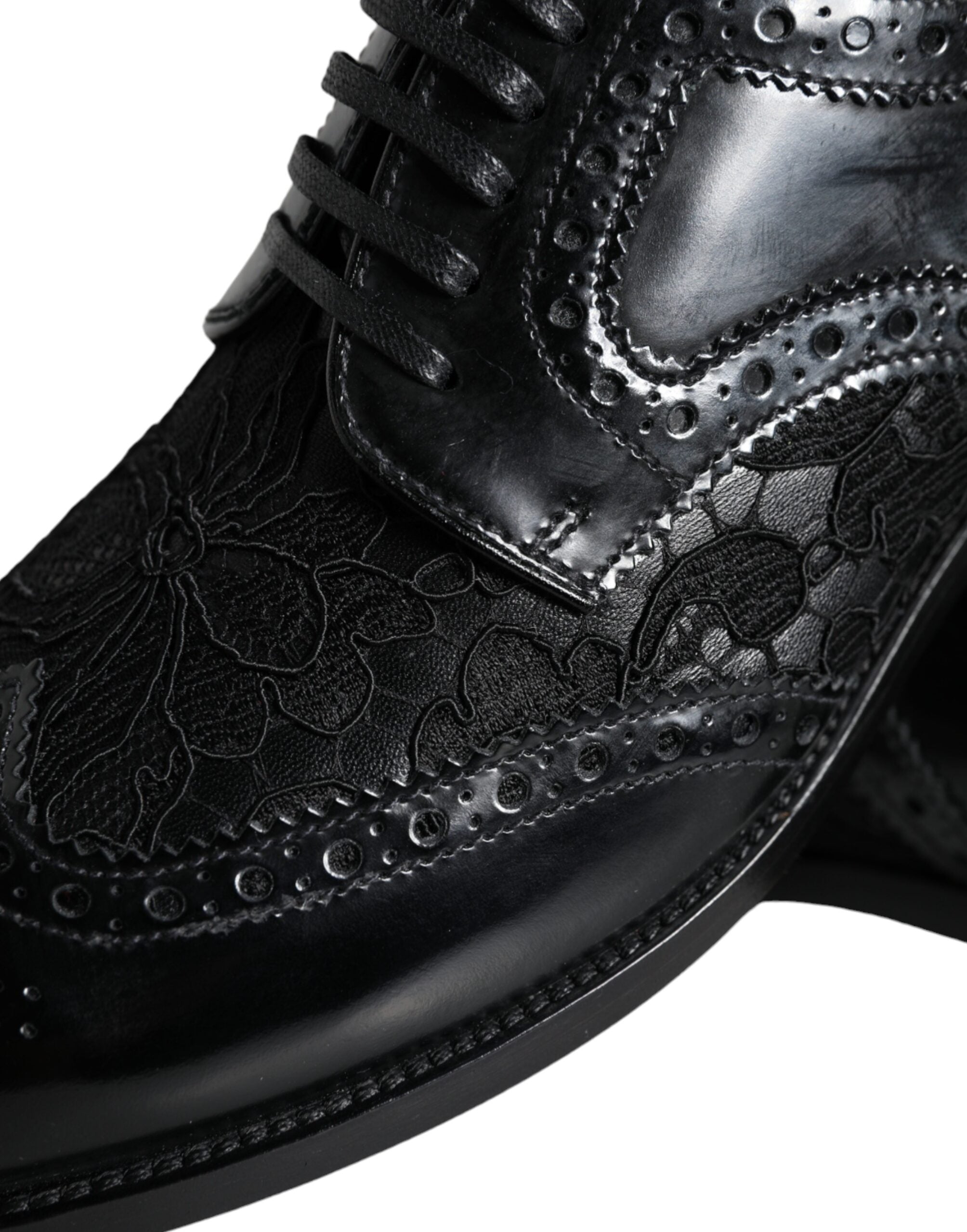 Dolce & Gabbana – Formelle Schuhe aus schwarzem Leder mit floraler Spitze