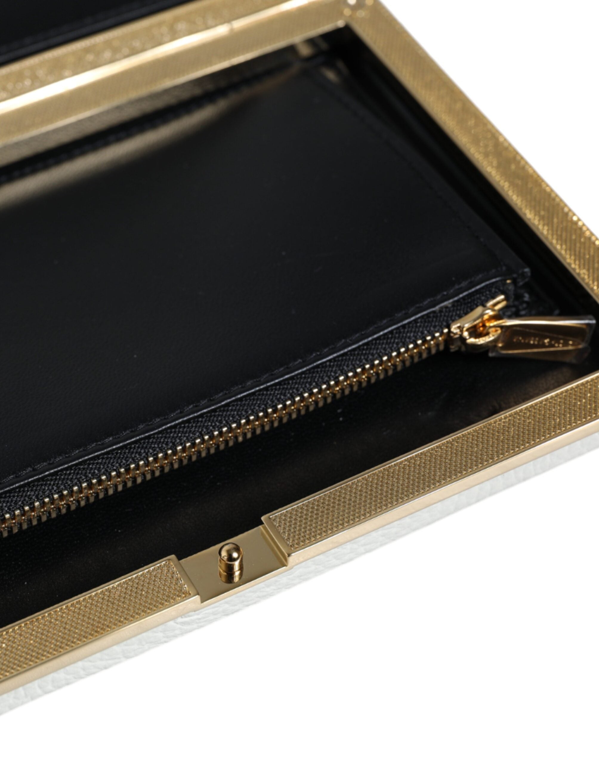 Dolce & Gabbana Clutch aus weißem Leder mit goldenem Rahmen, Abendtasche