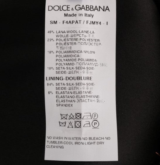 Dolce & Gabbana – Eleganter Bleistiftrock mit hoher Taille und goldenen Fransen