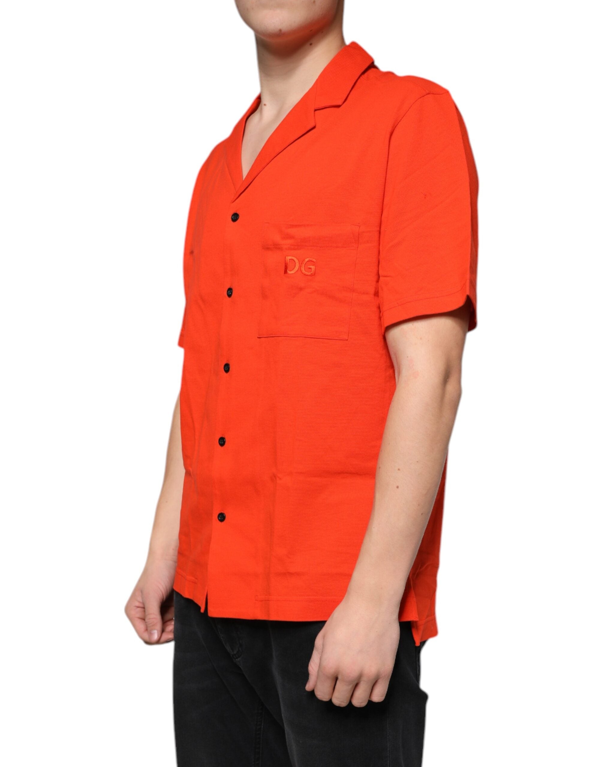 Dolce & Gabbana – Lässiges Poloshirt aus Baumwolle mit Knopfleiste in Orange