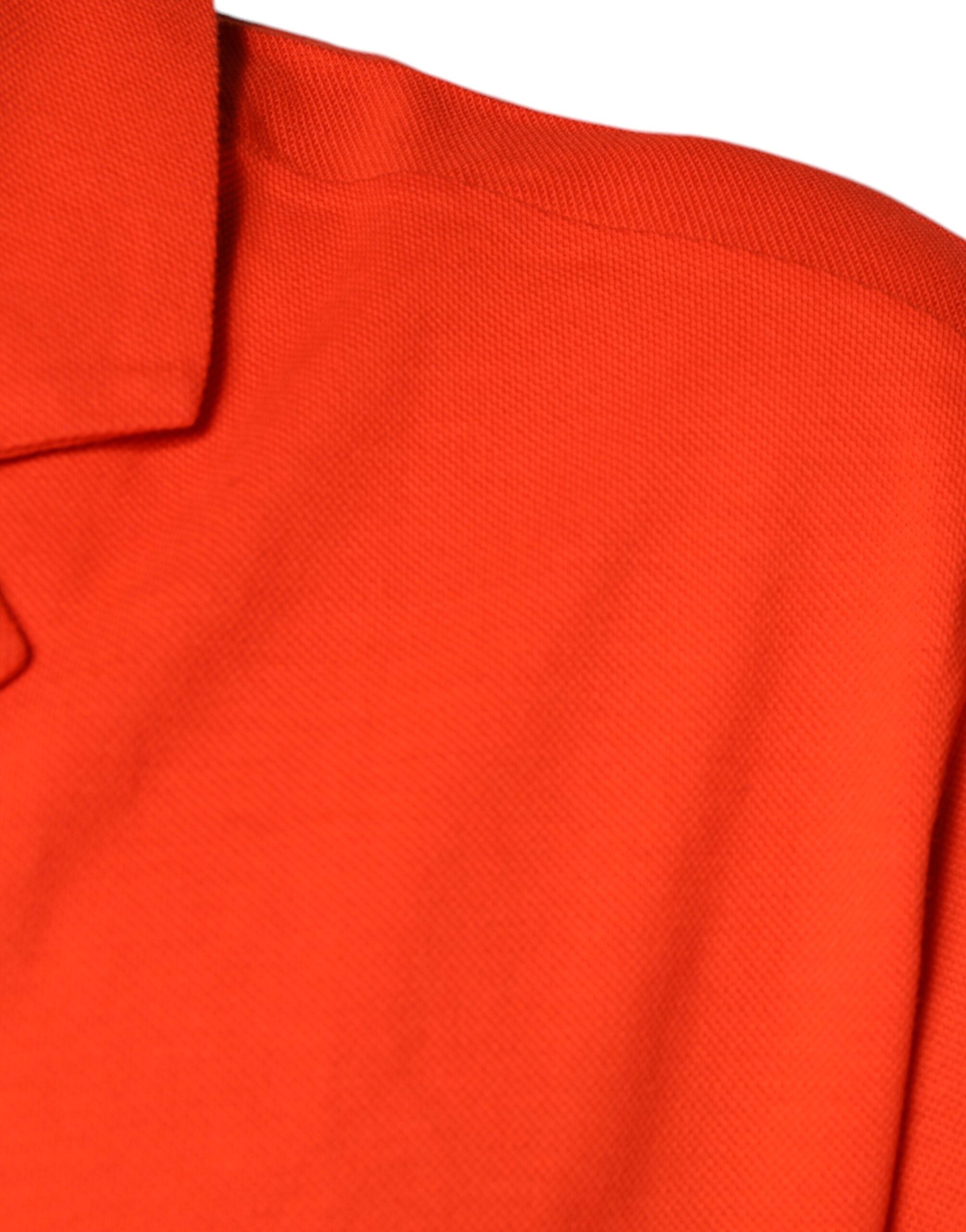 Dolce & Gabbana – Lässiges Poloshirt aus Baumwolle mit Knopfleiste in Orange