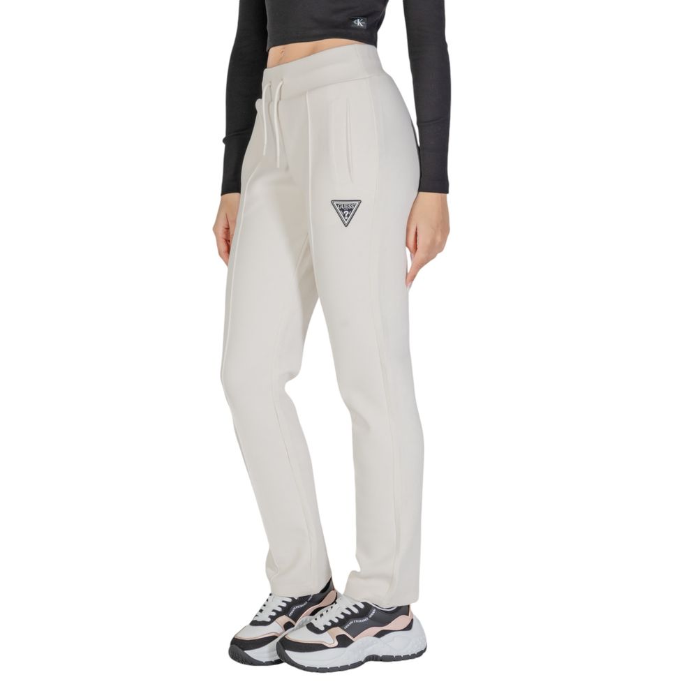 Blugi și pantaloni Guess Active din bumbac crem