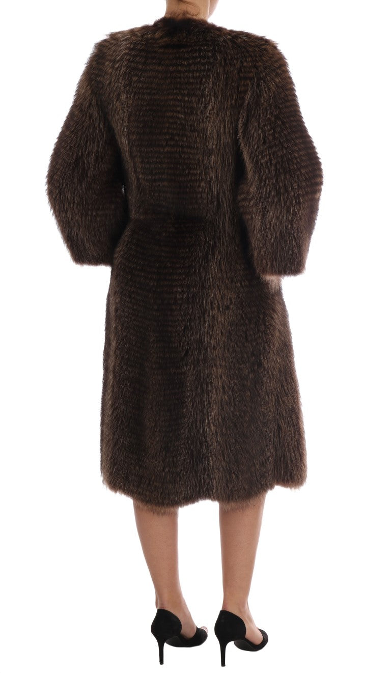 Dolce & Gabbana Eleganter knielanger Mantel aus braunem Waschbärpelz
