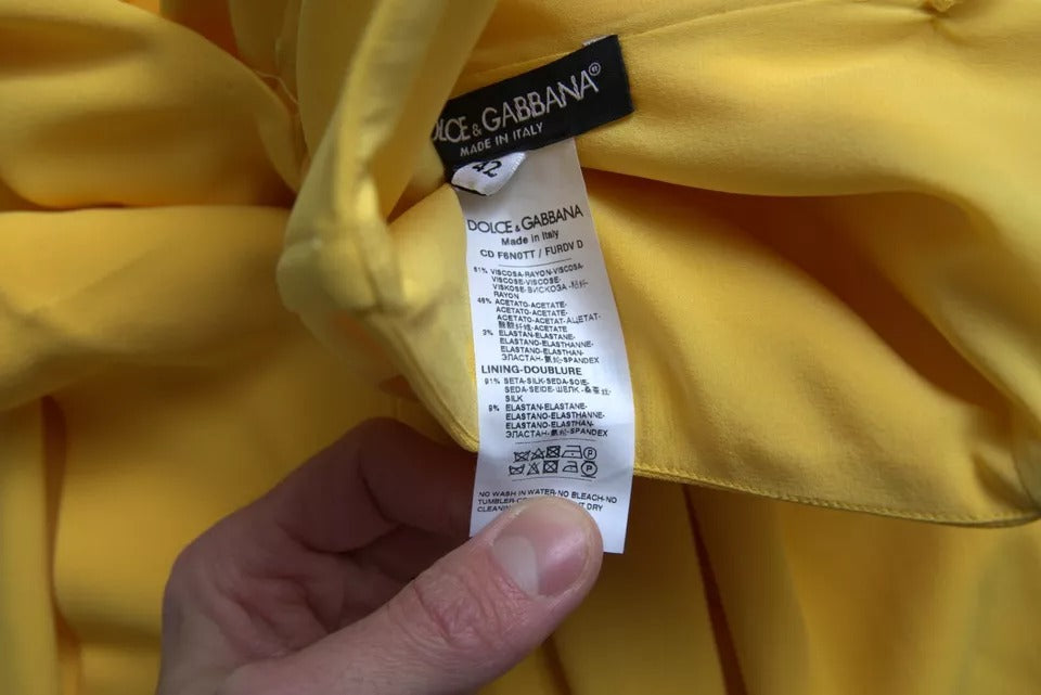 Rochie midi galbenă Dolce & Gabbana cu crăpătură laterală pe un umăr
