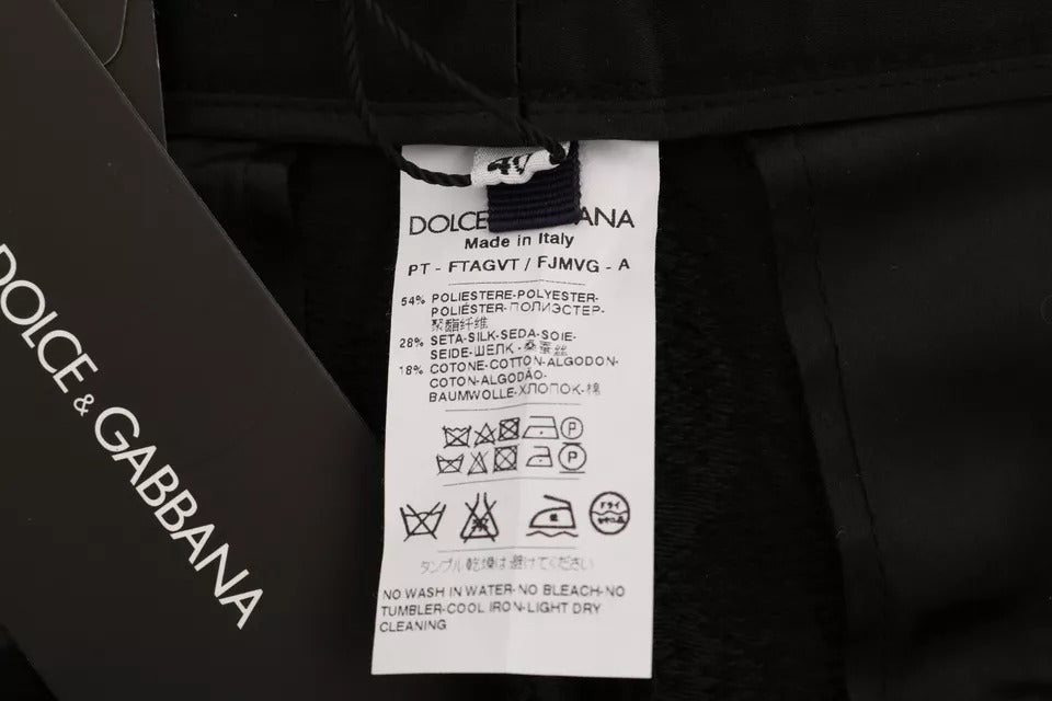 Dolce & Gabbana Schwarze, hoch taillierte Hose aus geblümtem Brokat