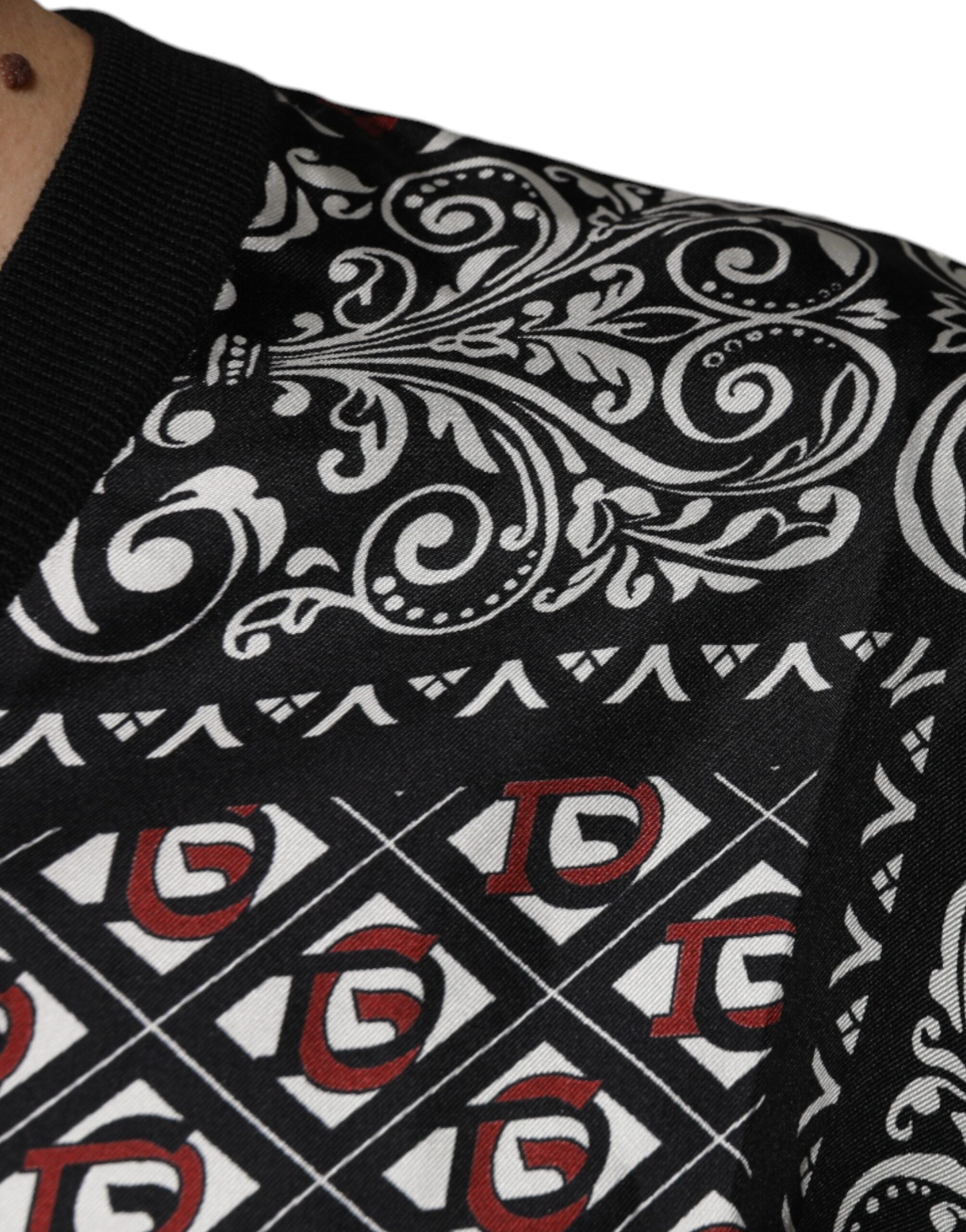 Dolce & Gabbana – Schwarzer Pullover aus Wolle mit V-Ausschnitt und Logo