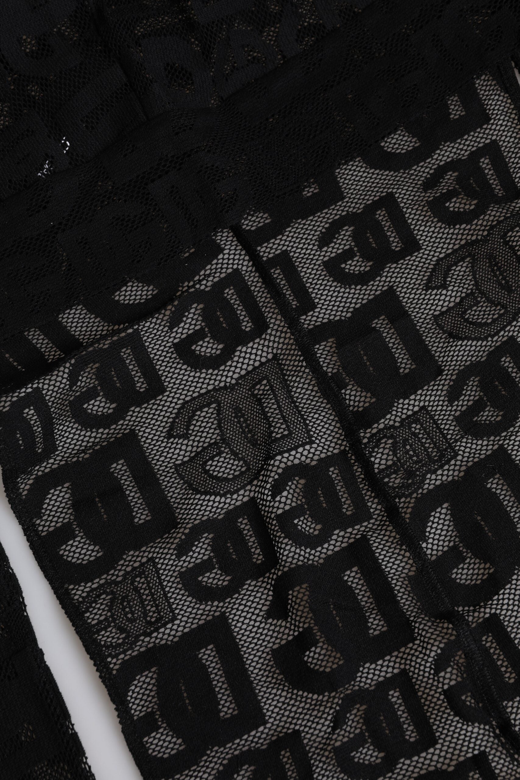 Pălărie Dolce & Gabbana cu logo negru din plasă și înfășurare pe tot capul