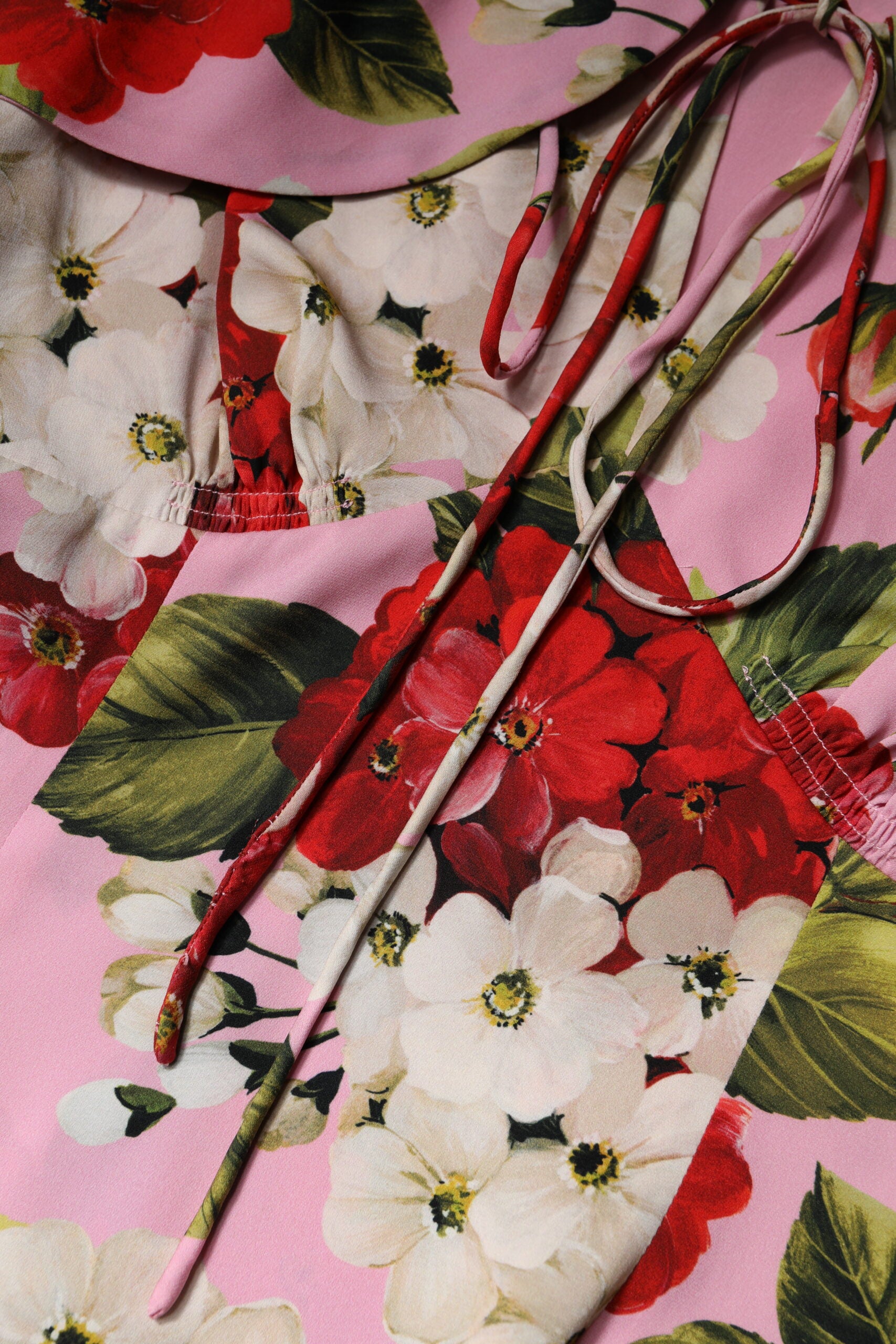 Dolce & Gabbana – Kurzärmliges Blusentop aus Seide mit Blumenmuster in Rosa