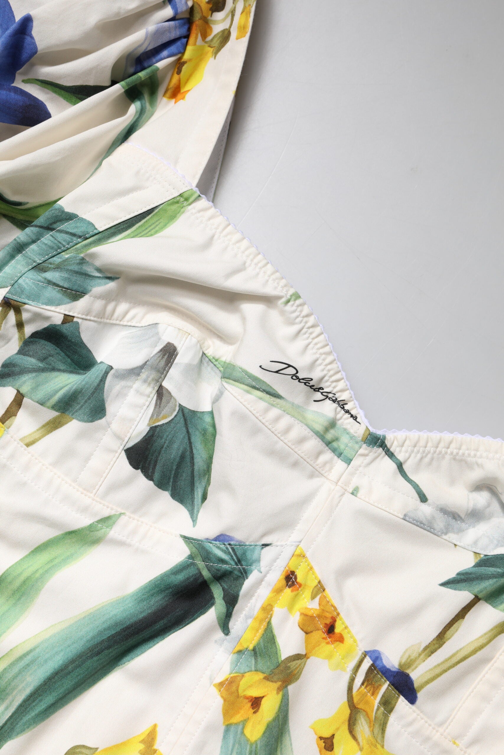 Dolce & Gabbana – Kurze Bluse mit Puffärmeln und Blumenmuster in Weiß