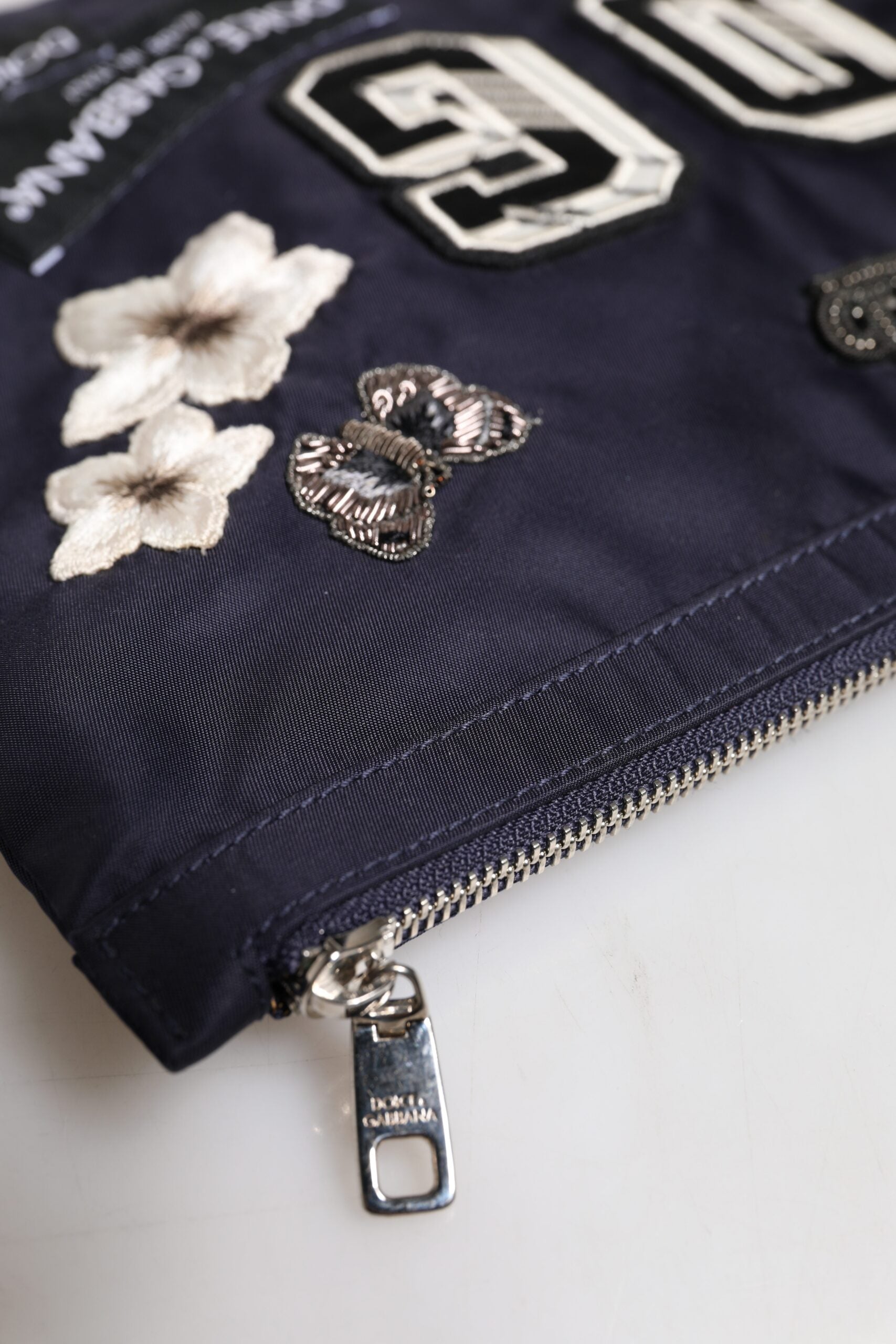 Dolce & Gabbana – Blaue Clutch mit DG-Logo-Patch