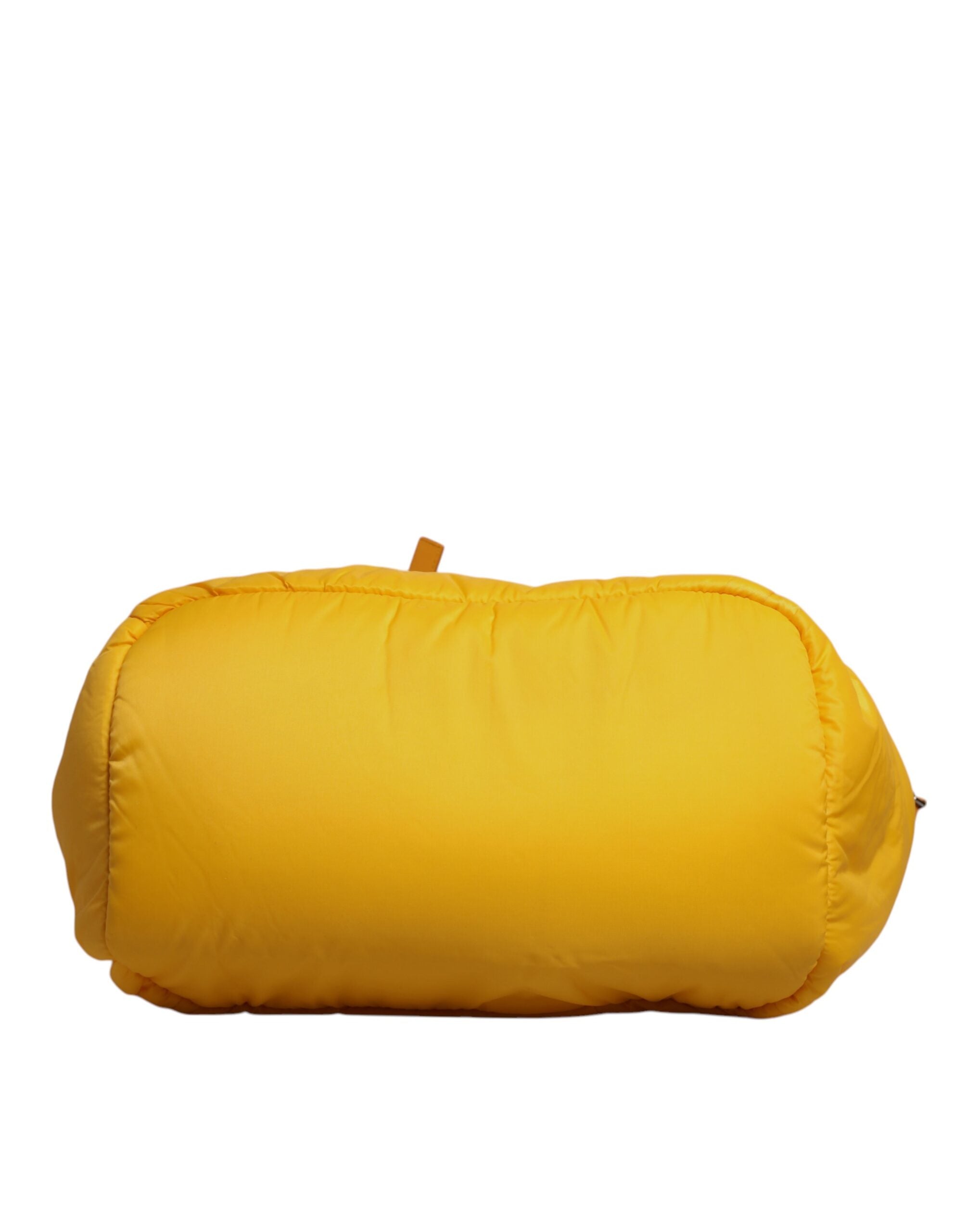 Dolce & Gabbana – Gelb-orangefarbene Reisetasche aus Nylon mit Logo-Plakette