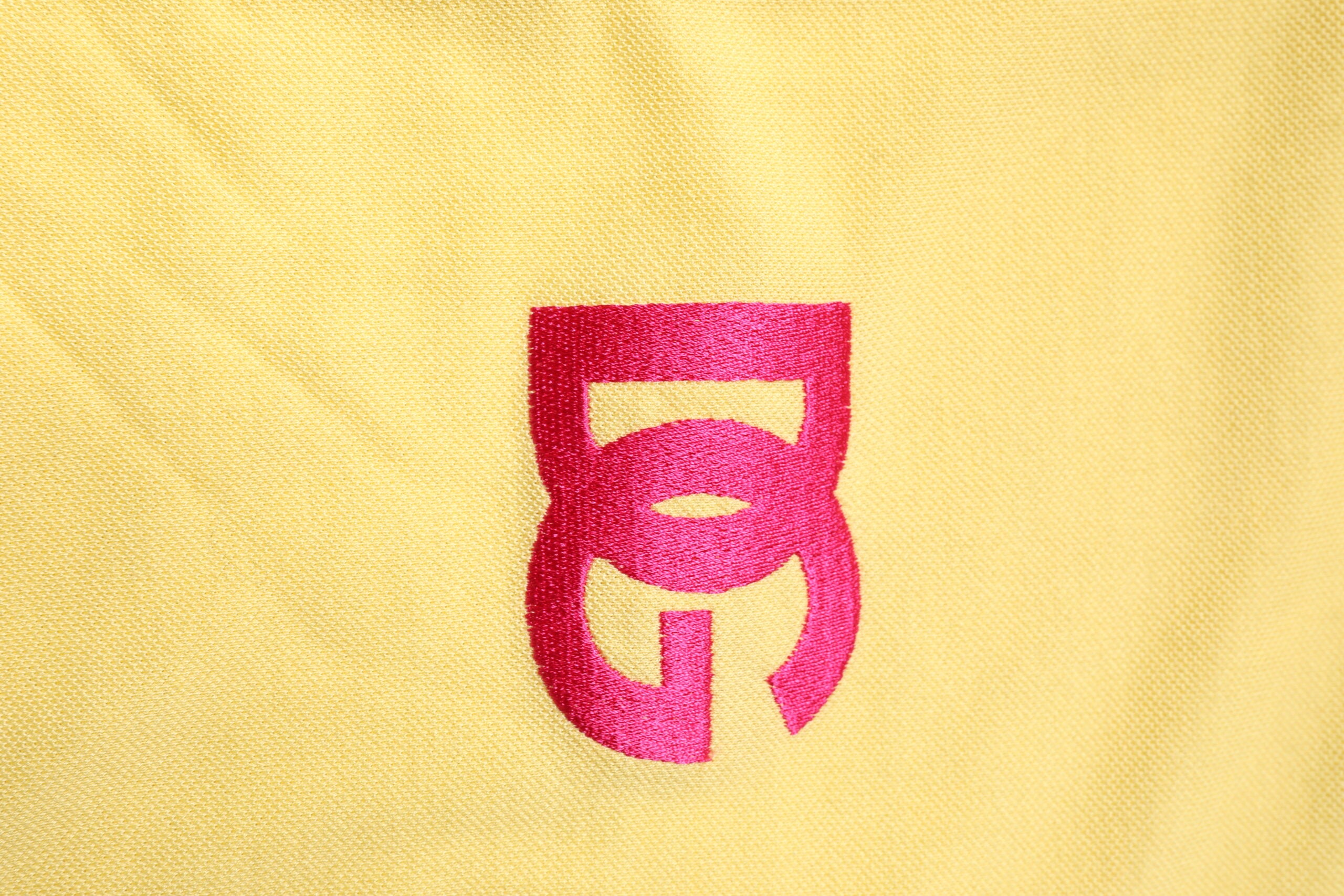 Dolce & Gabbana – Gelbes Poloshirt aus Baumwolle mit Logo und Kragen