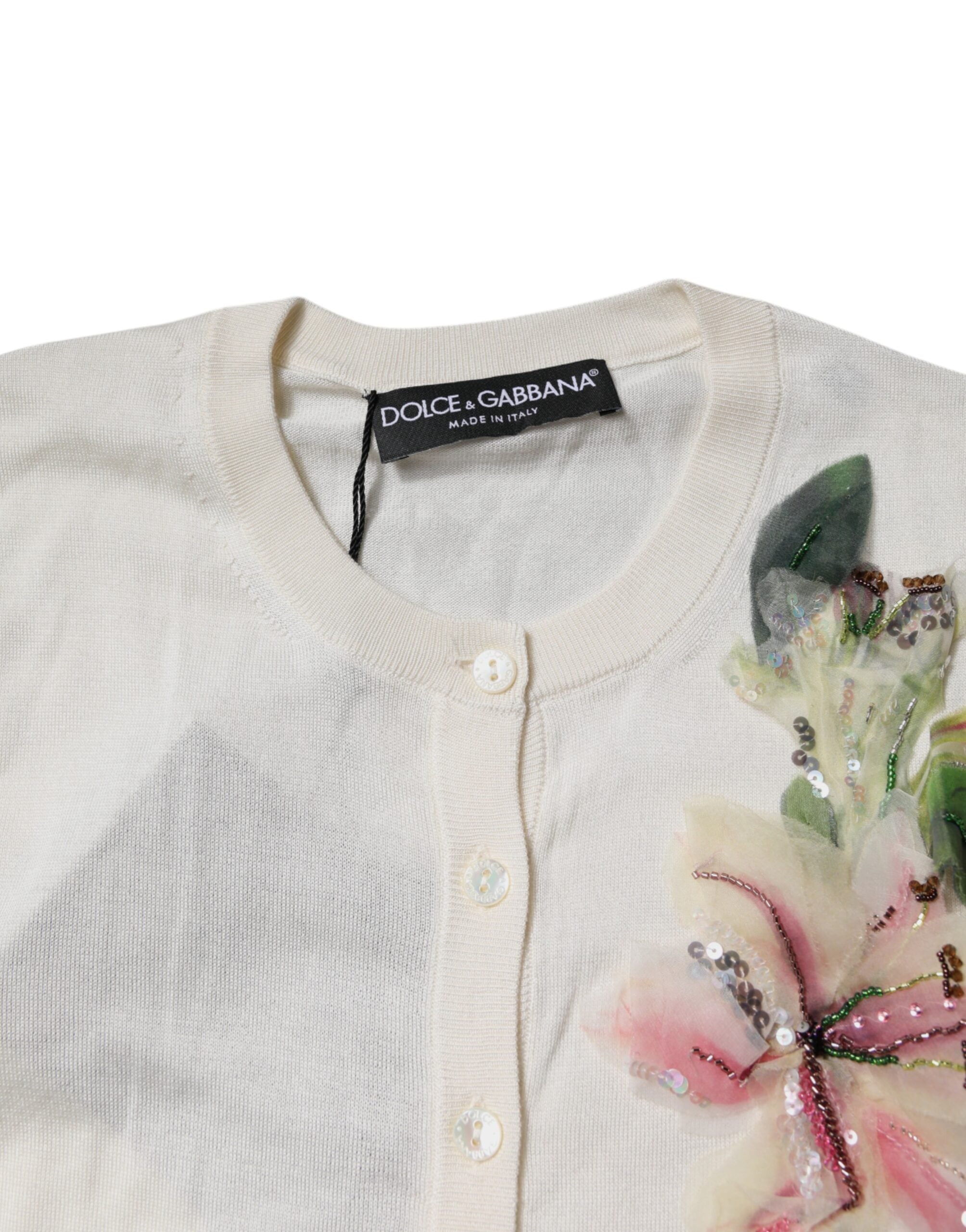 Dolce & Gabbana – Cremefarbener Cardigan aus Seide mit Blumenverzierung