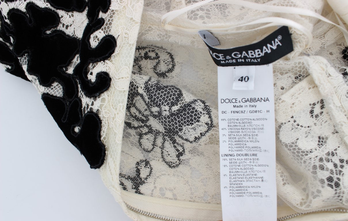 Dolce & Gabbana Elegantes Maxikleid mit Flügelärmeln und Blumenspitze