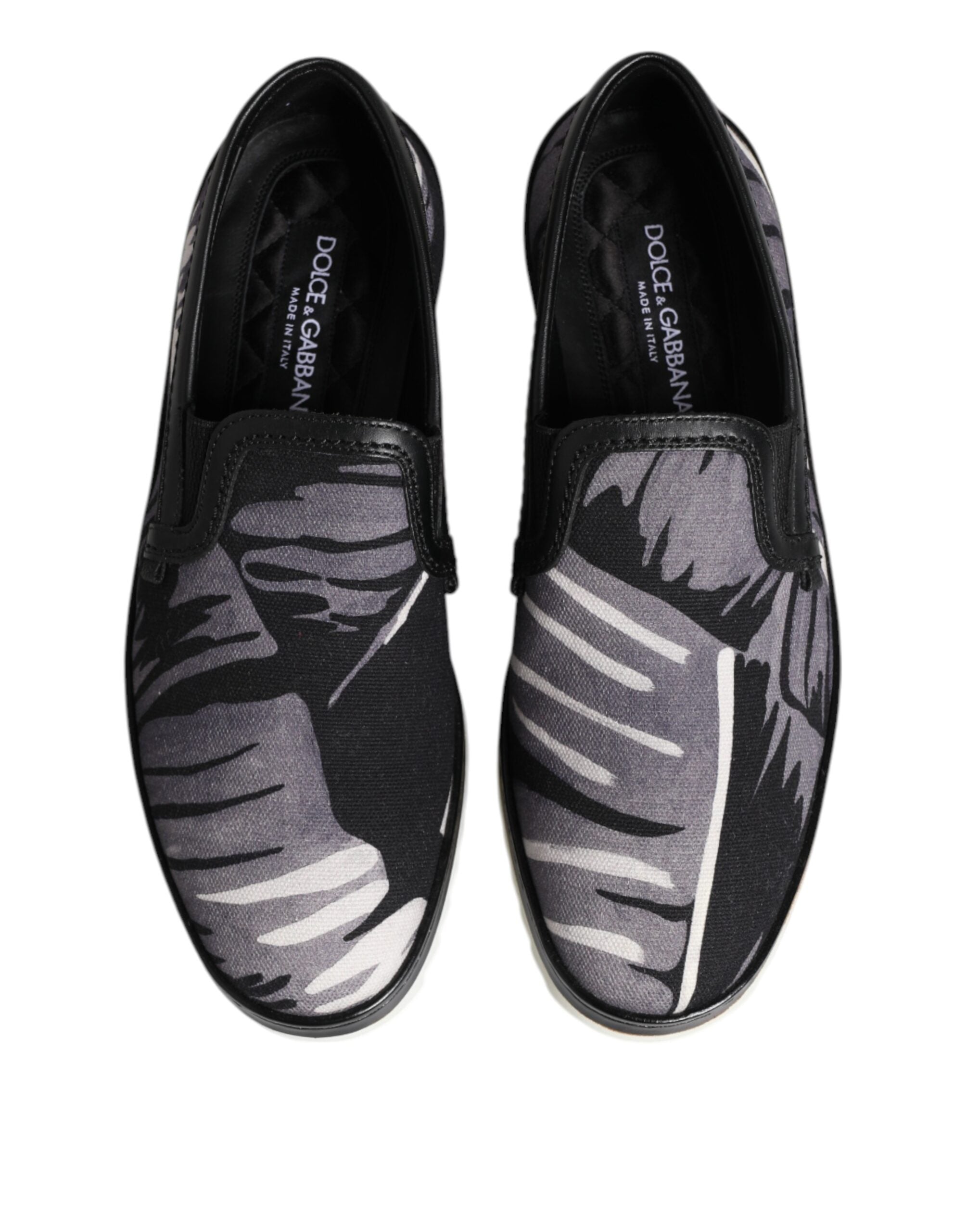 Dolce & Gabbana – Schwarze Slip-On-Sneakers mit tropischem Muster für Herren