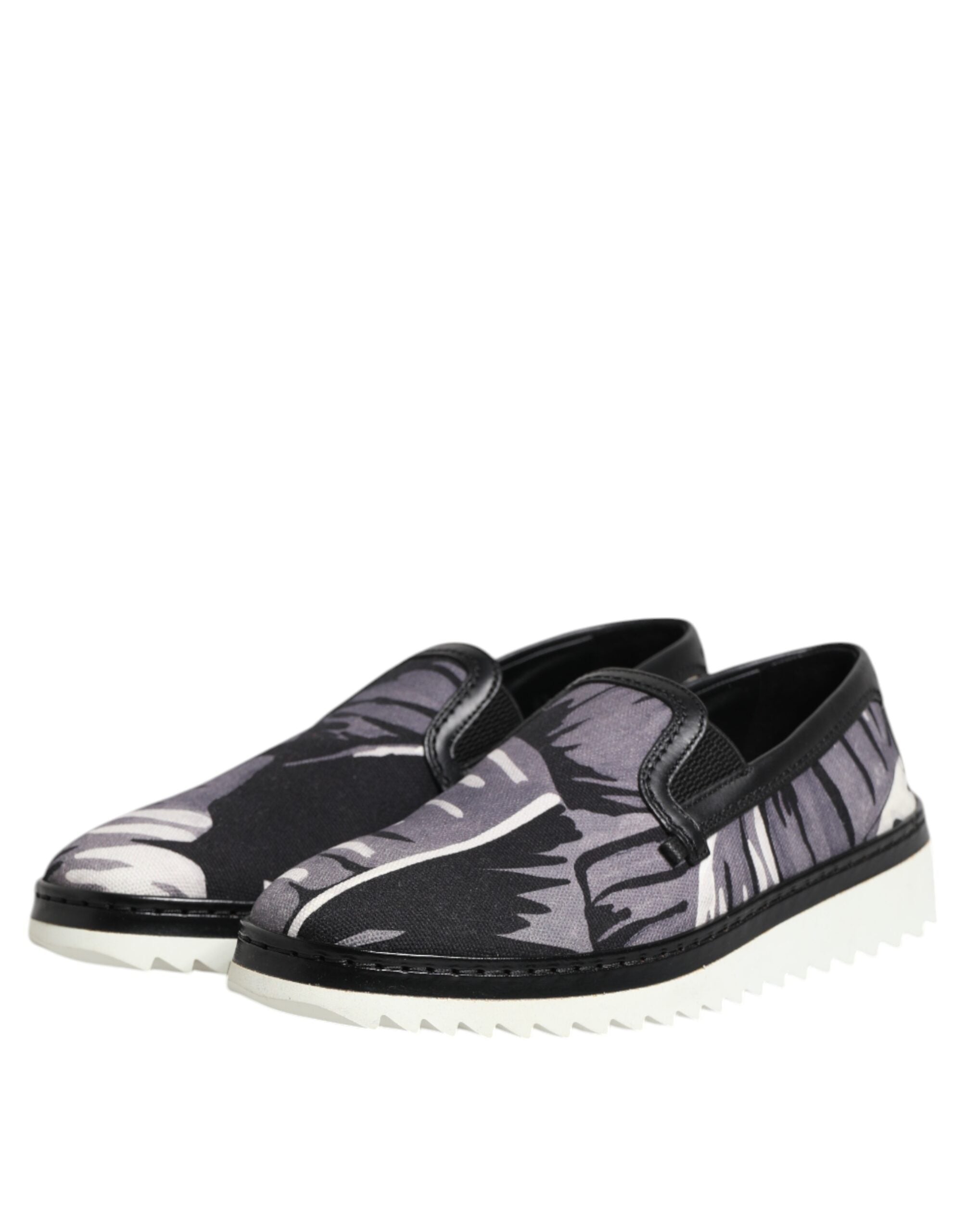 Dolce & Gabbana – Schwarze Slip-On-Sneakers mit tropischem Muster für Herren