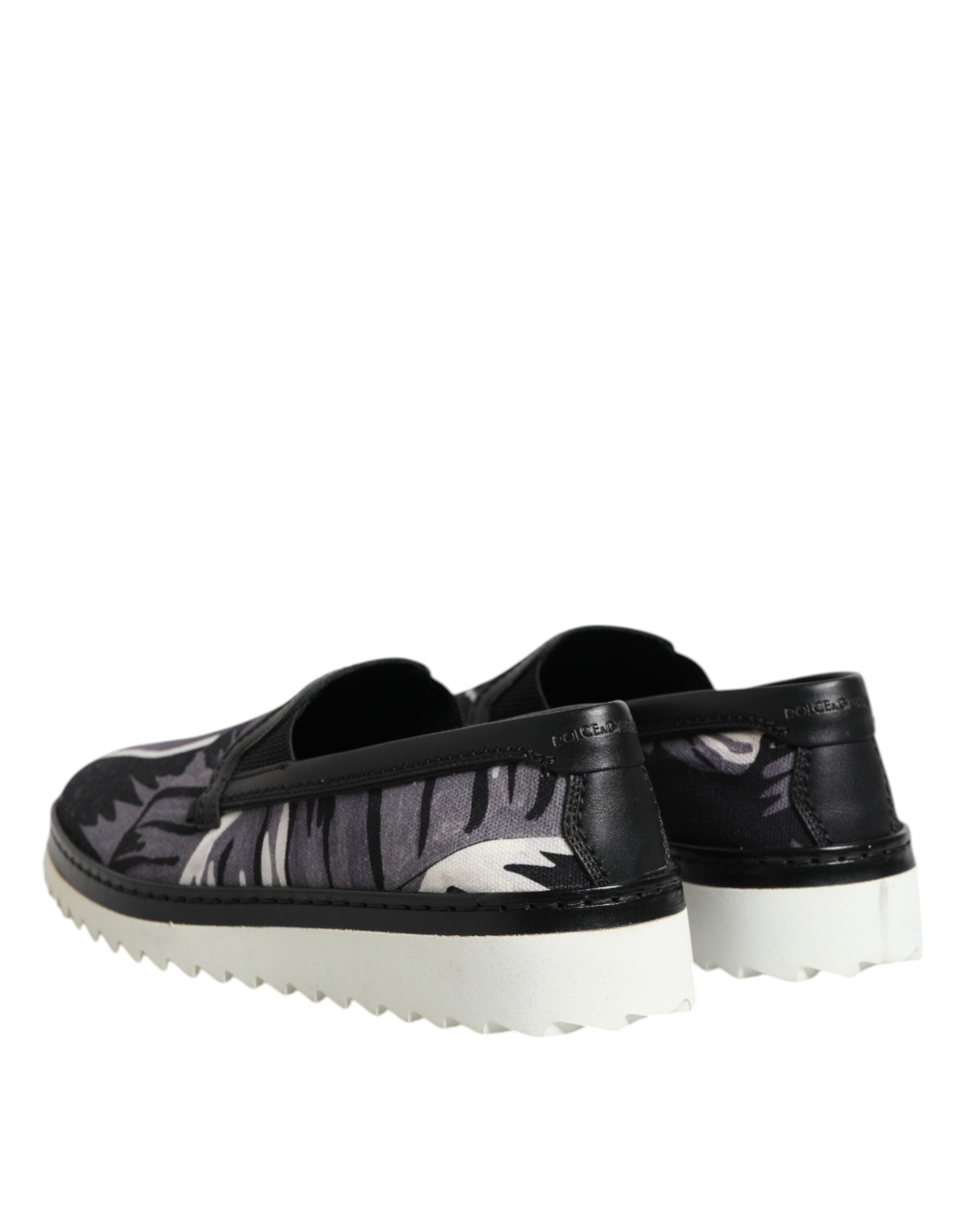 Dolce & Gabbana – Schwarze Slip-On-Sneakers mit tropischem Muster für Herren