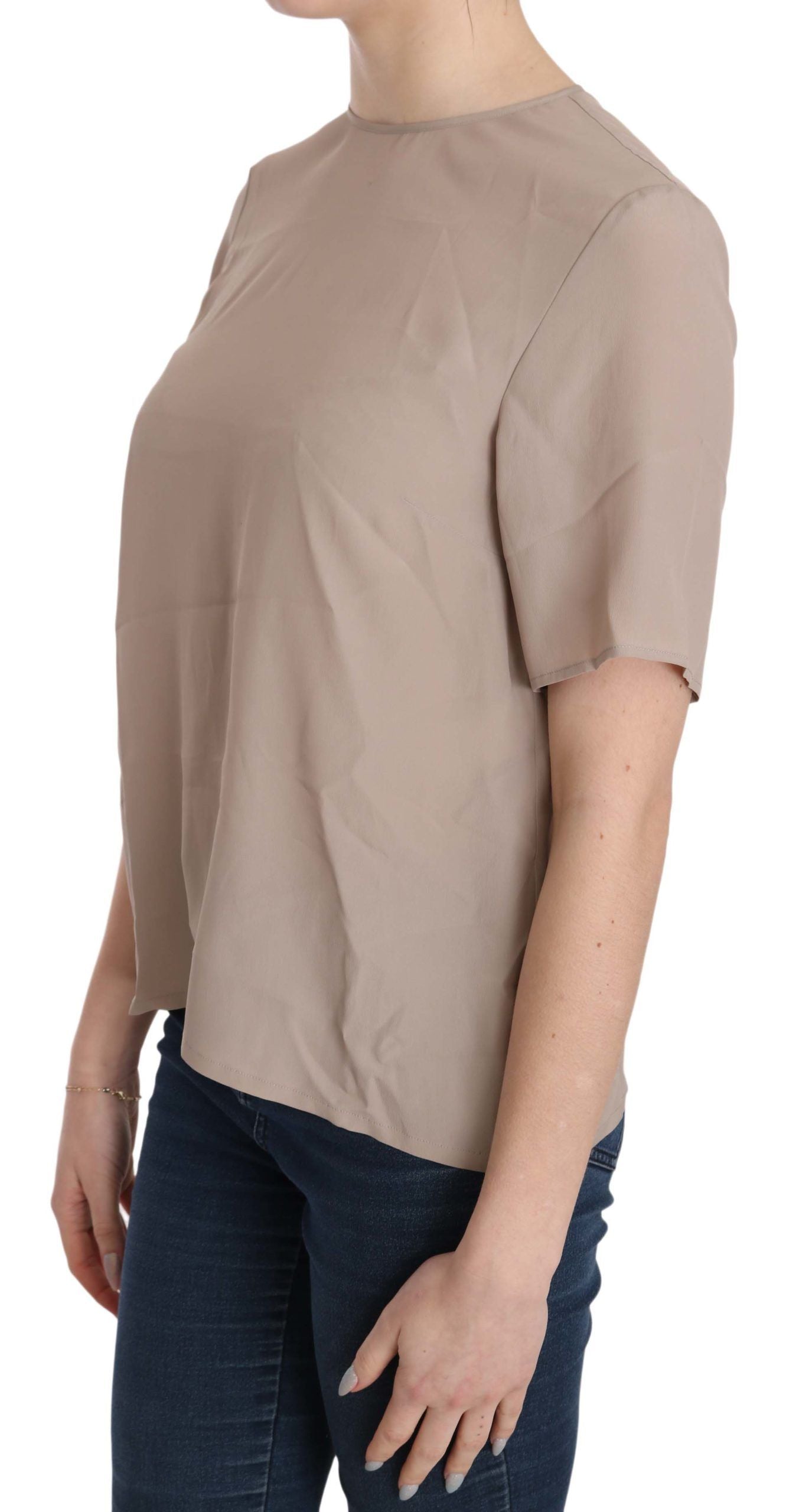 Dolce &amp; Gabbana Elegante beige Bluse mit Rundhalsausschnitt aus Seidenmischung