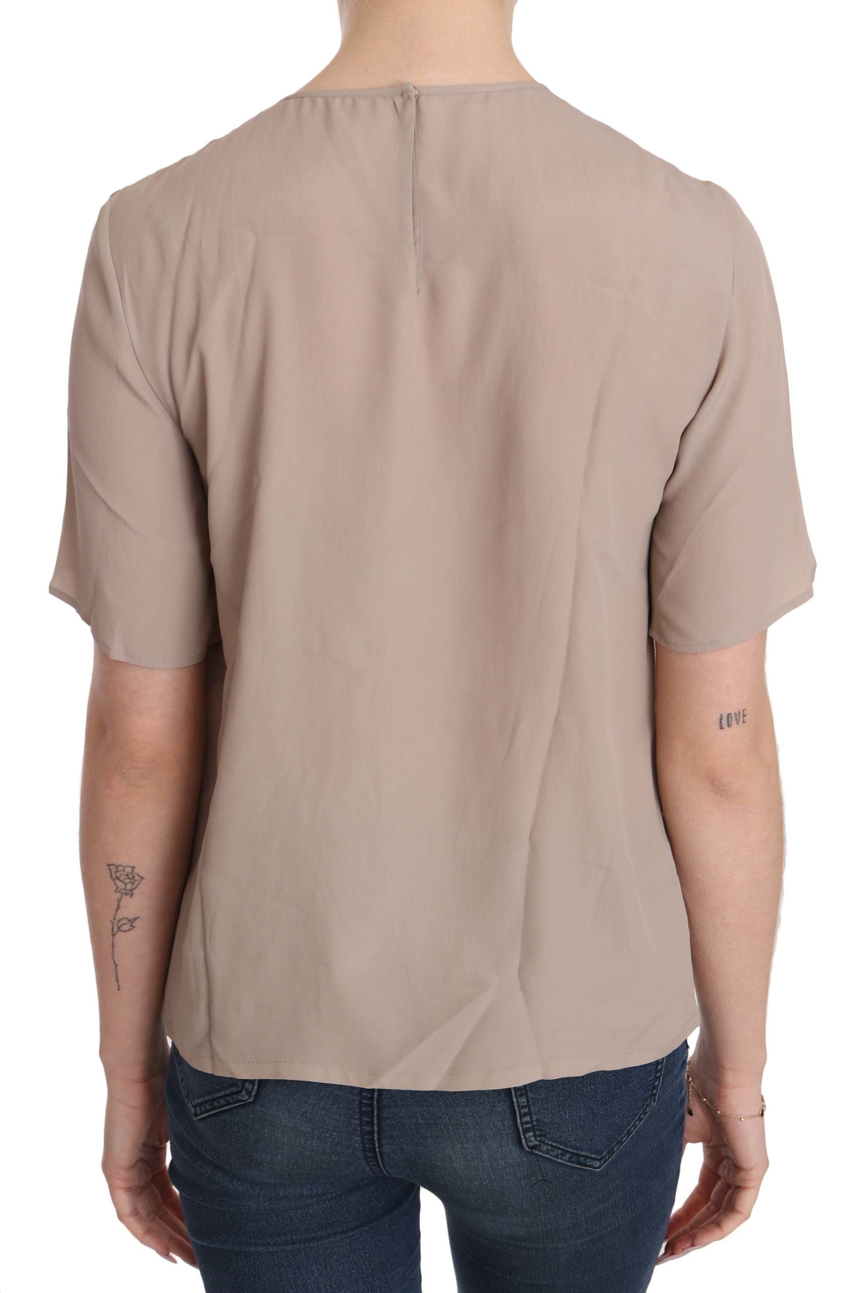 Dolce &amp; Gabbana Elegante beige Bluse mit Rundhalsausschnitt aus Seidenmischung