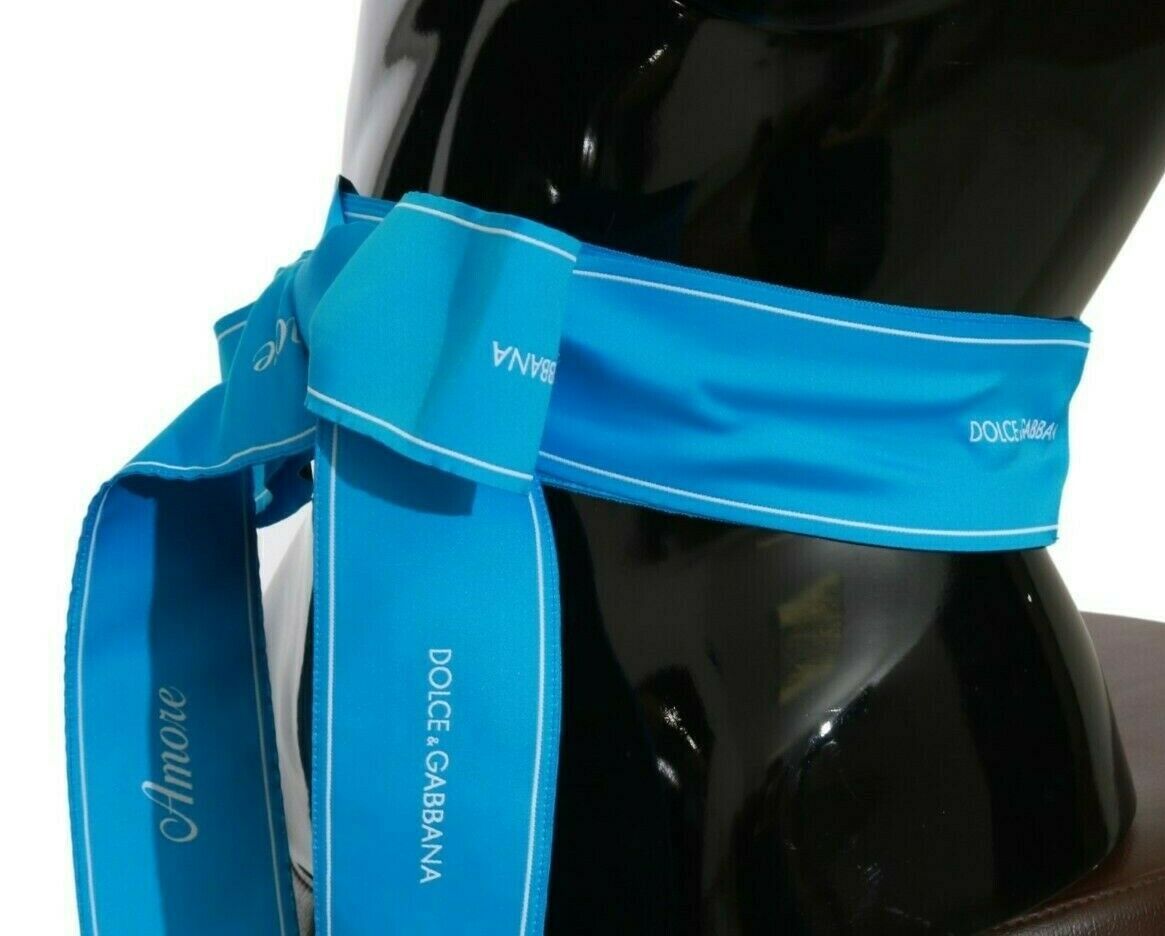 Dolce &amp; Gabbana Eleganter Taillengürtel mit Schleife und Druckknopf in Blau