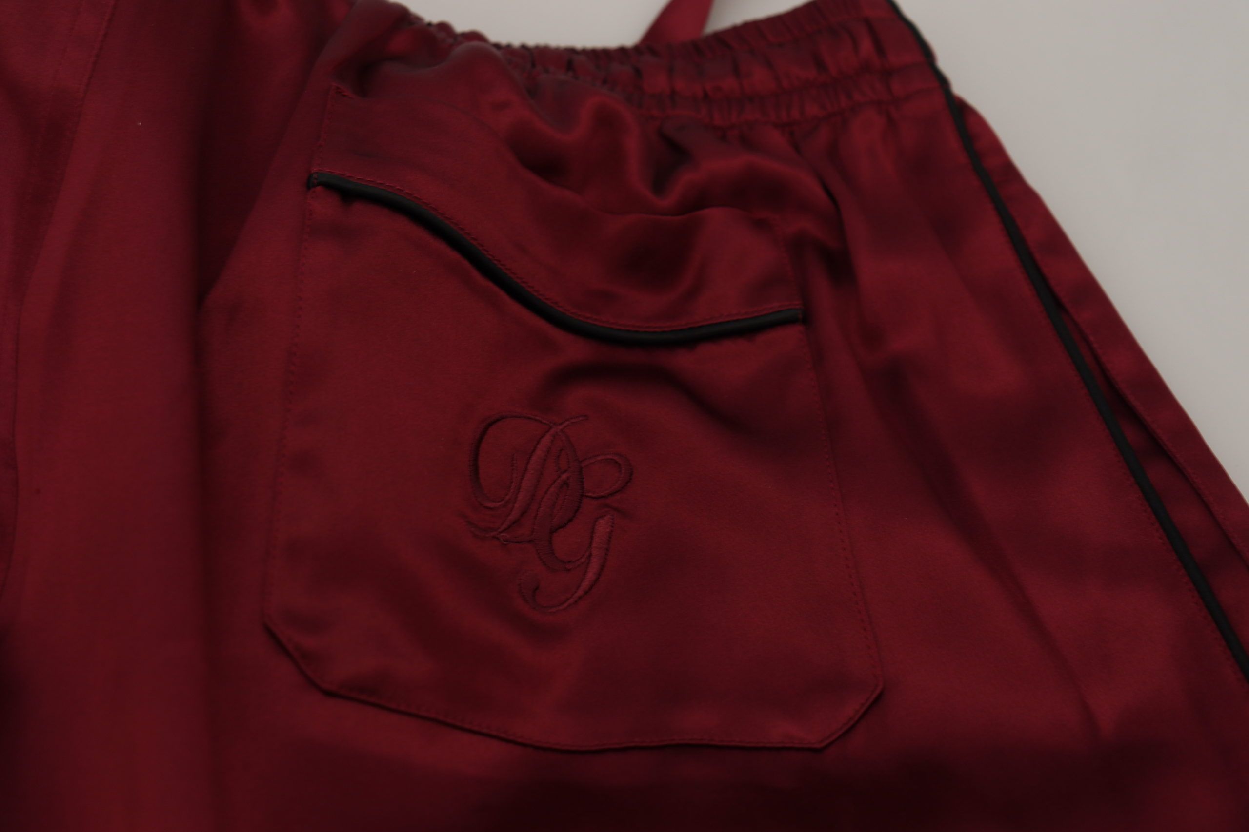 Dolce &amp; Gabbana – Loungehose aus Seide in Bordeaux
